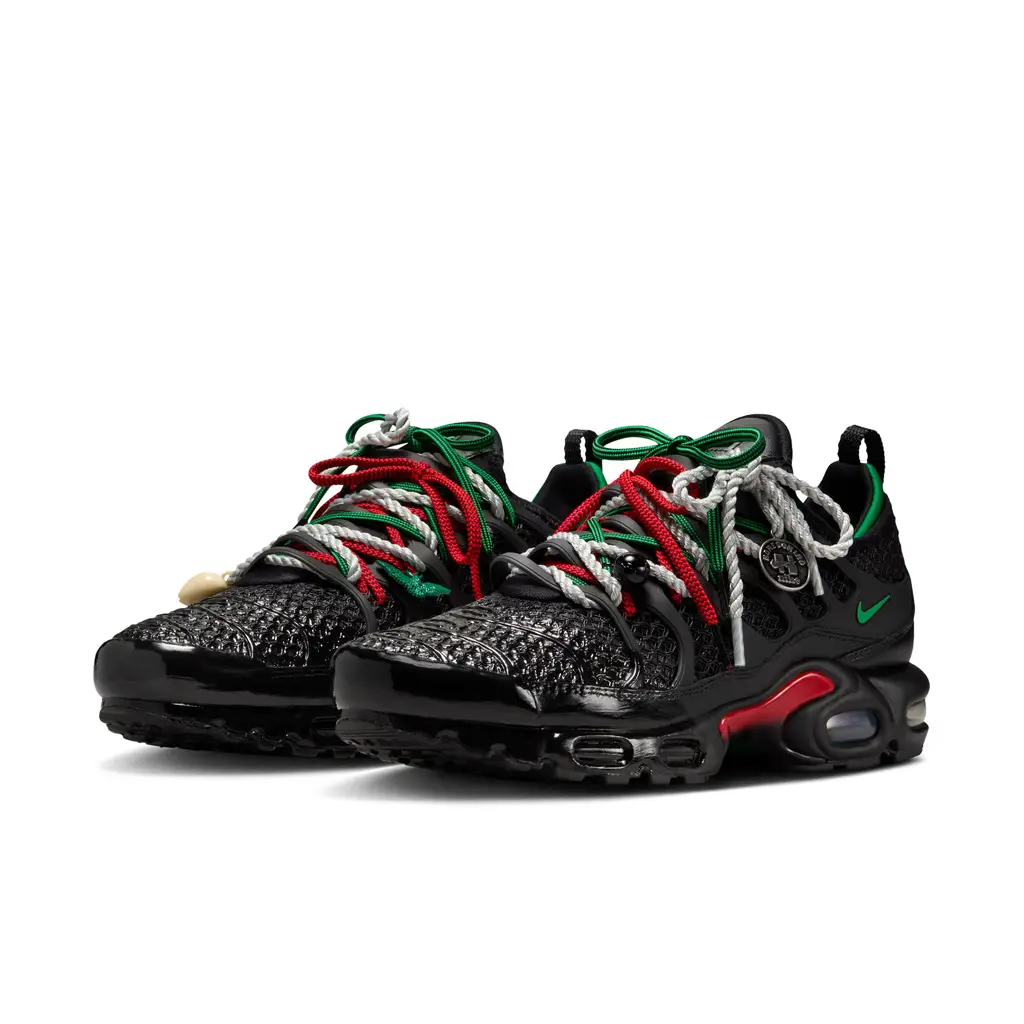 HOMECOMING x Nike Air Max Plus Pan-African IM4960-001 hero image showing black mesh upper with red green Pan-African gradient