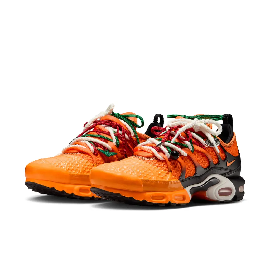 HOMECOMING x Nike Air Max Plus African Sunrise IM4960-800 hero image showing orange gradient upper with Safety Orange and Bright Mandarin