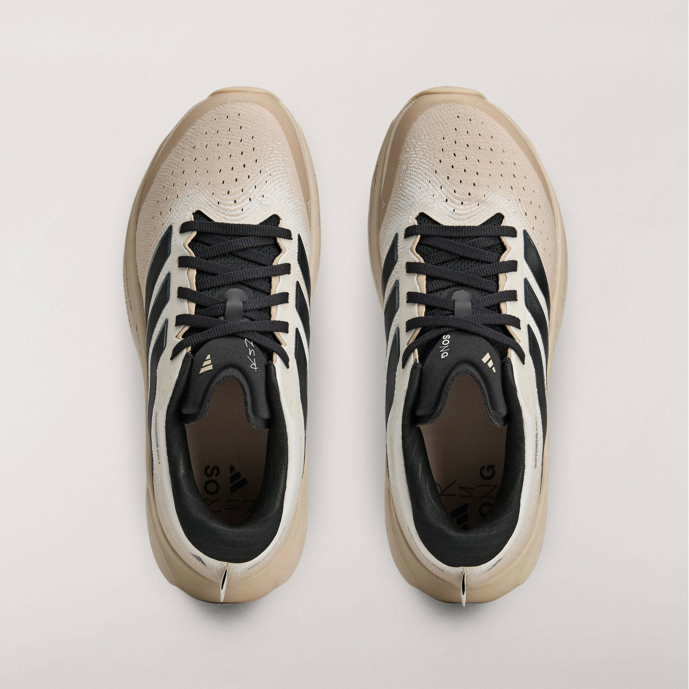 SFTM x adidas Supernova Rise 3 Off-White Black KI3617 middle