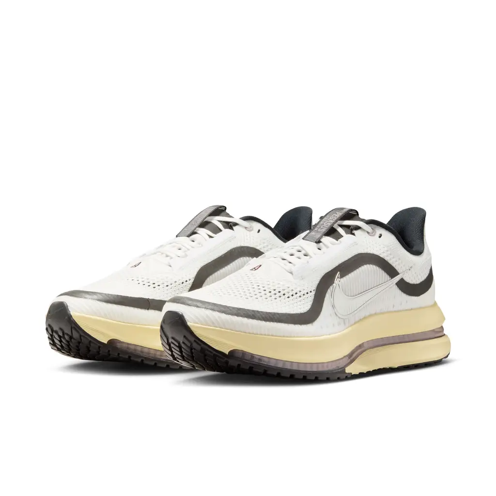 A Ma Maniere x Nike Pegasus Premium Summit White IM0701-100 hero image showing white mesh upper with black accents and metallic silver Swoosh
