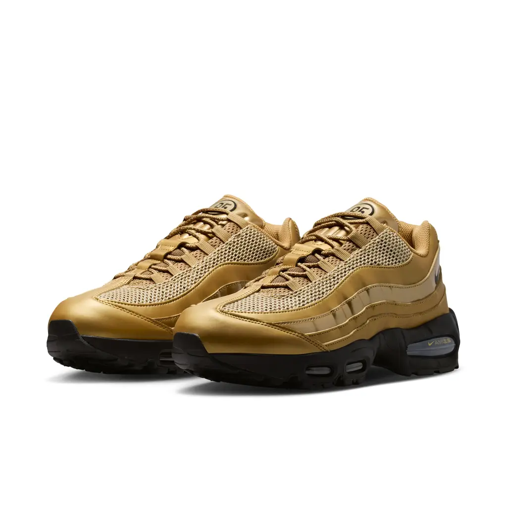 Nike Air Max 95 Total 90 Metallic Gold IV2872-707 hero image showing glossy metallic gold layered side panels and black sole unit