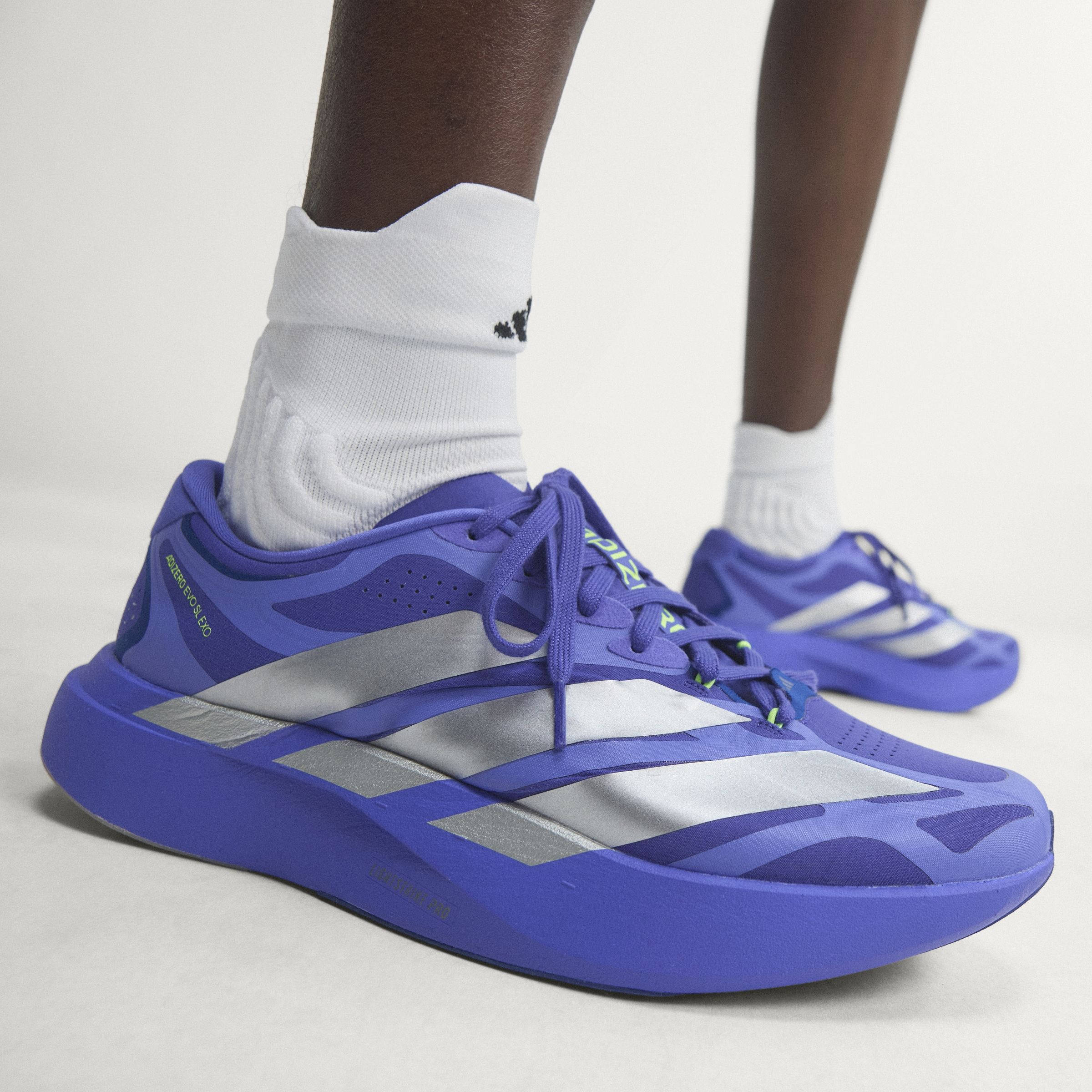 adidas Adizero EVO SL EXO Solar Purple Silver KJ0424 on foot feature