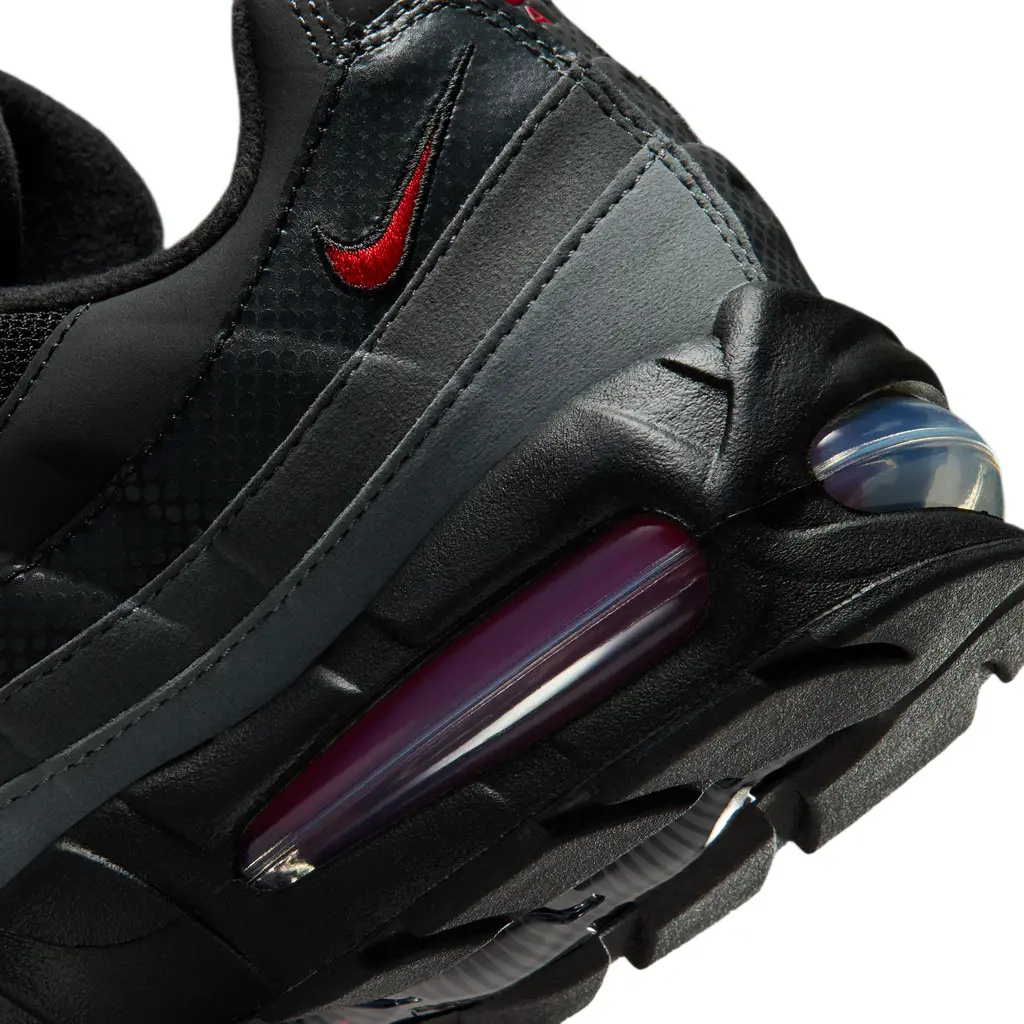 Nike Air Max 95 Black Red Anthracite close-up showing red-tinted visible Air unit and layered panel construction