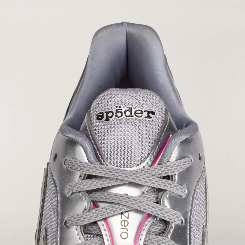 SP5DER x adidas F50 Formotion Silver Metallic close-up showing lenticular badge detailing