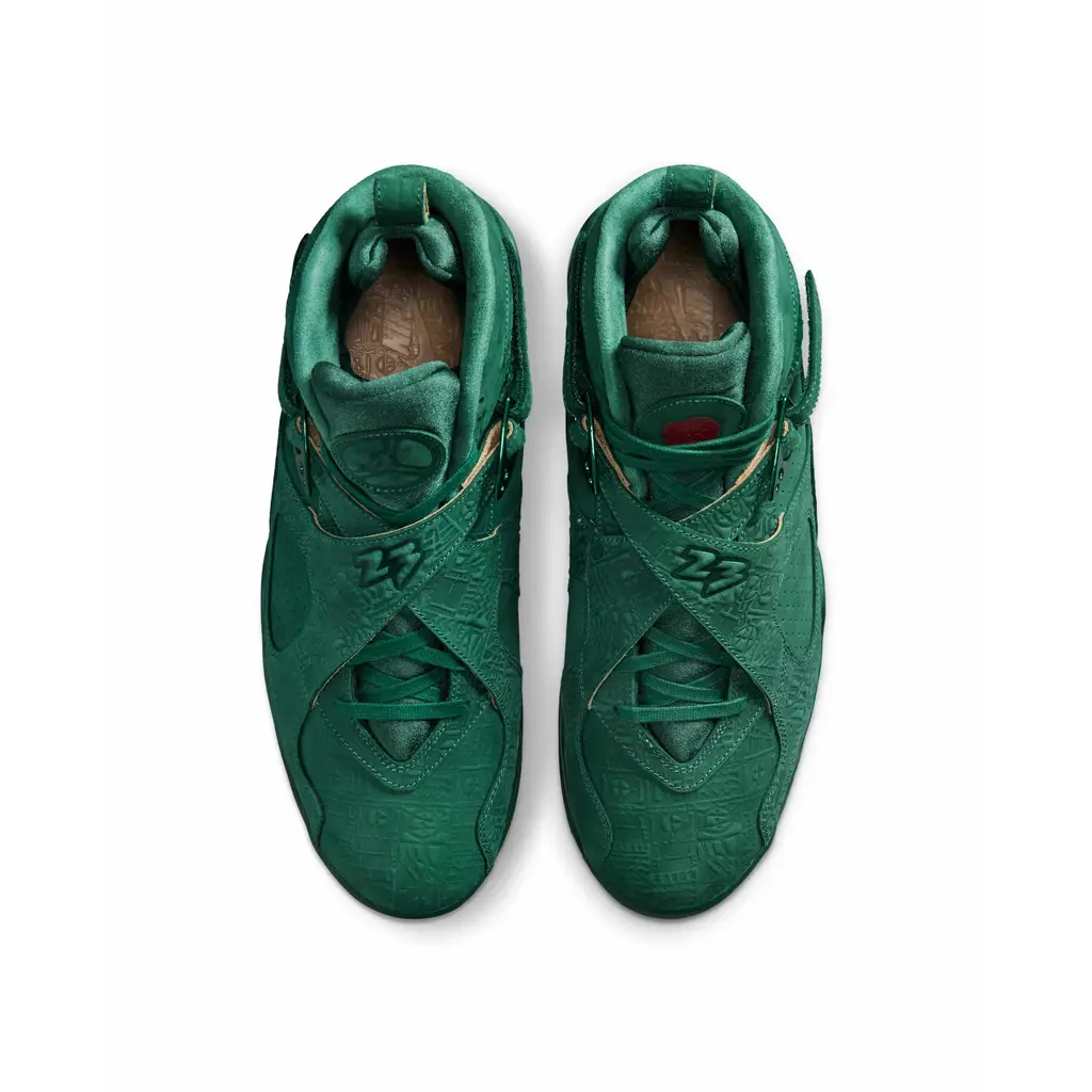 Air Jordan 8 Bin 23 midfoot detail showing perforated nubuck panels and glossy green mesh tongue