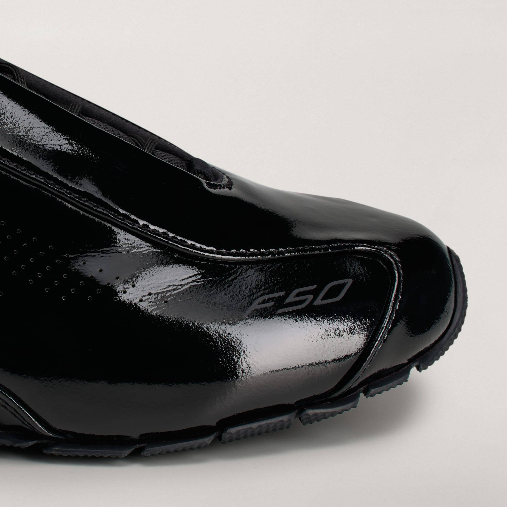 Arte Antwerp x adidas F50 Feather Patent Leather Black HQ3324 toe