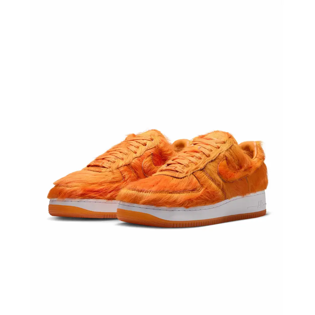 Nike Air Force 1 Low Orange Pony Hair IR1940-800 hero image showing Campfire Orange pony hair upper white midsole and orange outsole