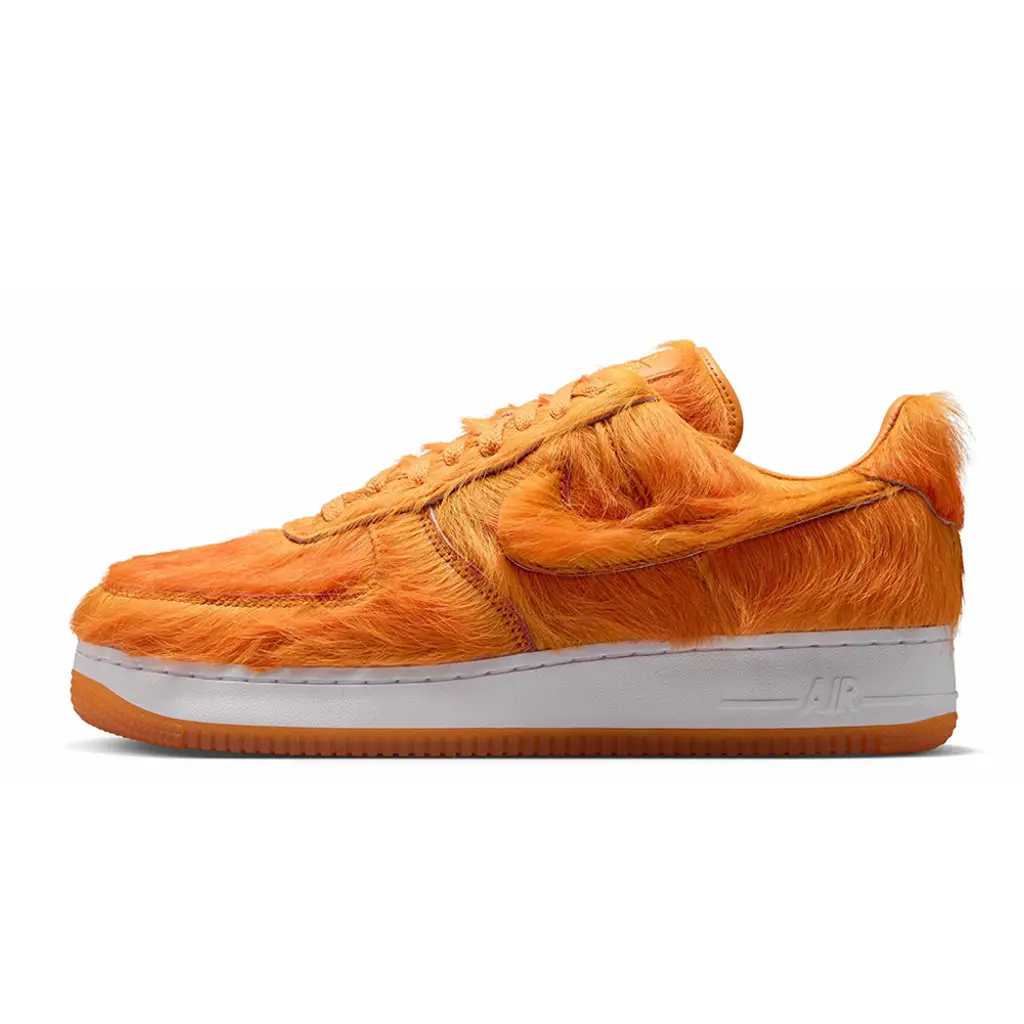 Nike Air Force 1 Low Orange Pony Hair lateral view showing full orange pony hair upper and Swoosh coverage