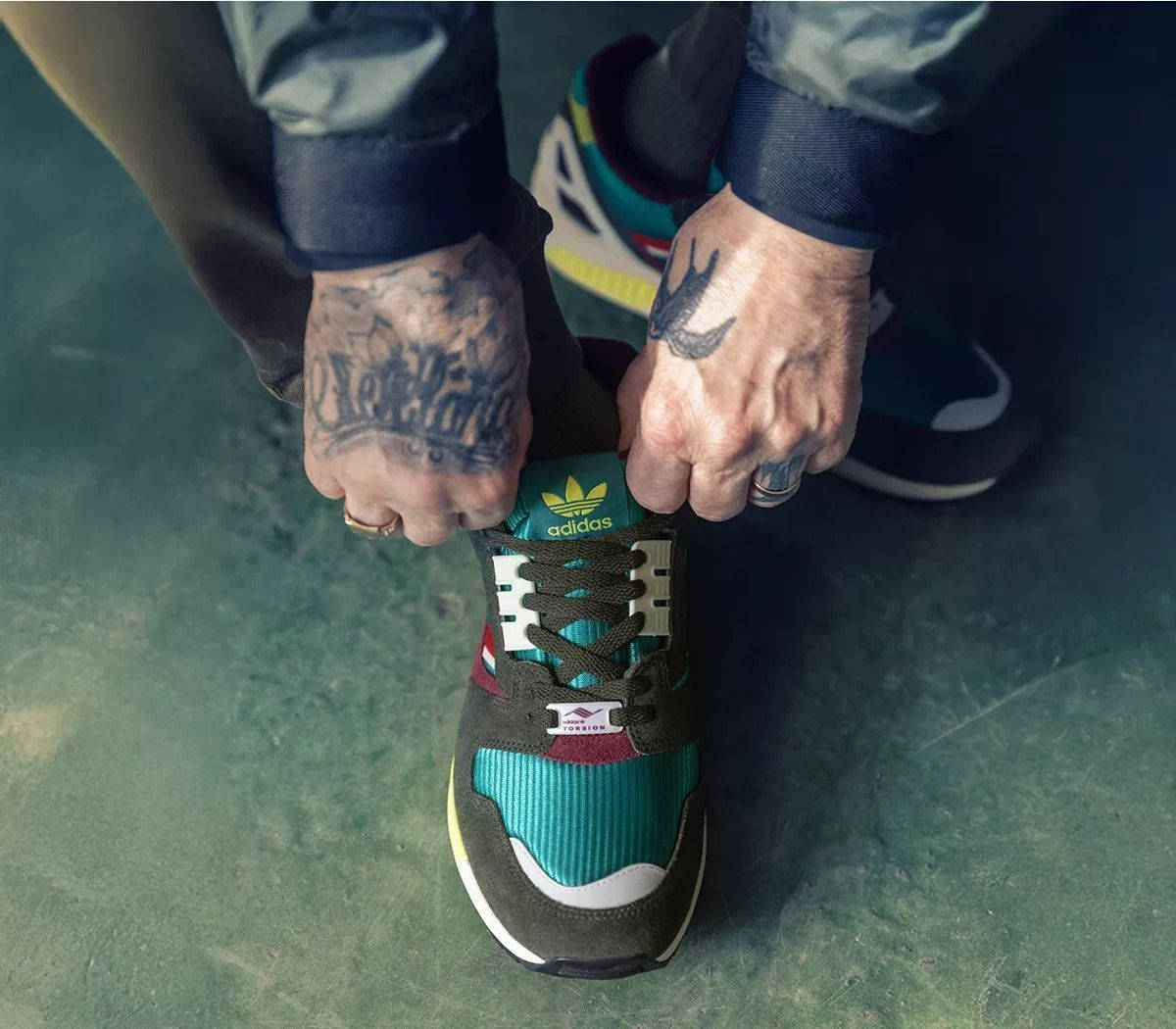 Offspring x adidas ZX 8000 Equipment Green Multi KI2521 on foot