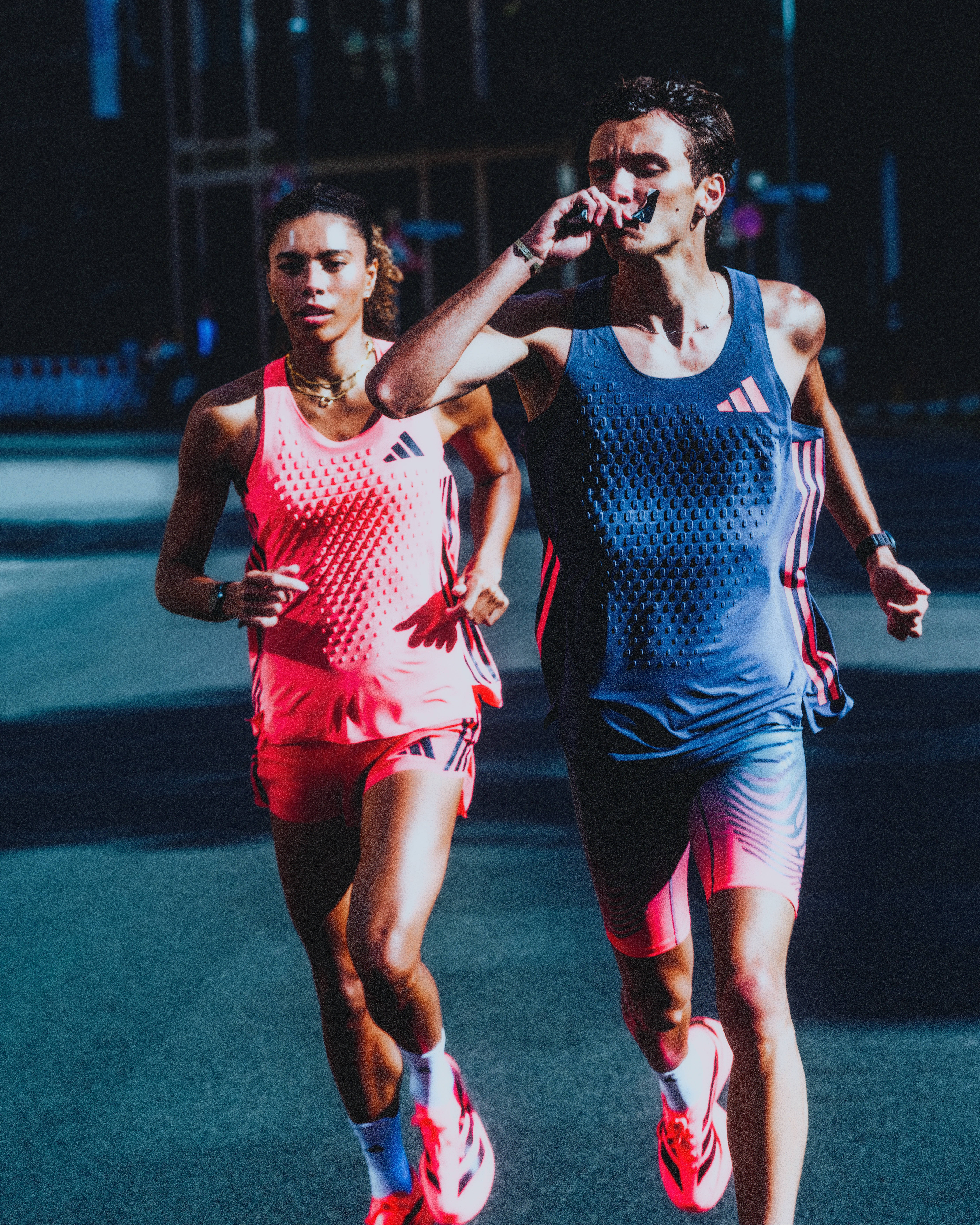 adidas athletes running adio pro 5 male taking race gel