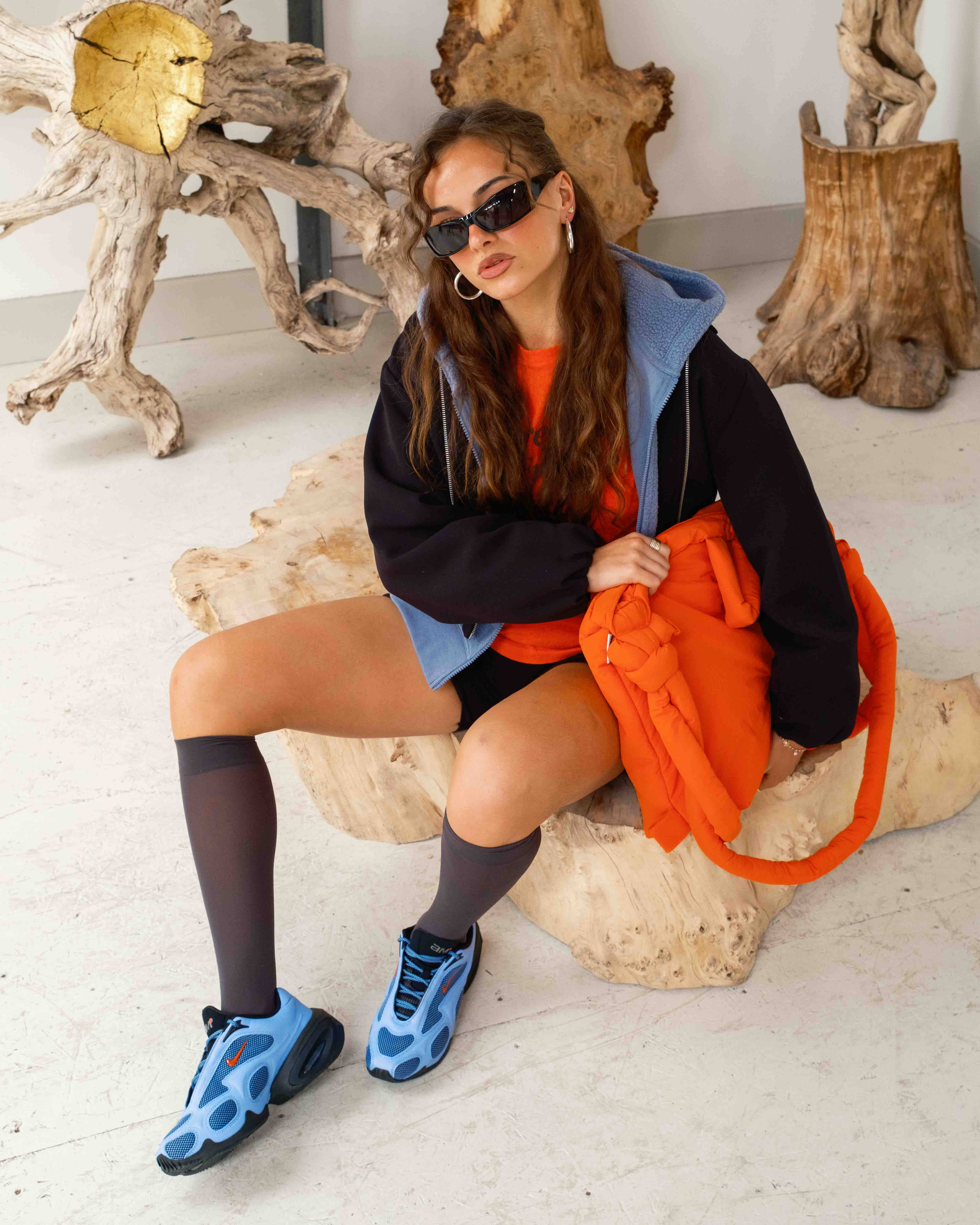 outfit 1 fashion forward fit Nike air max muse styled sat down on wooden chair and