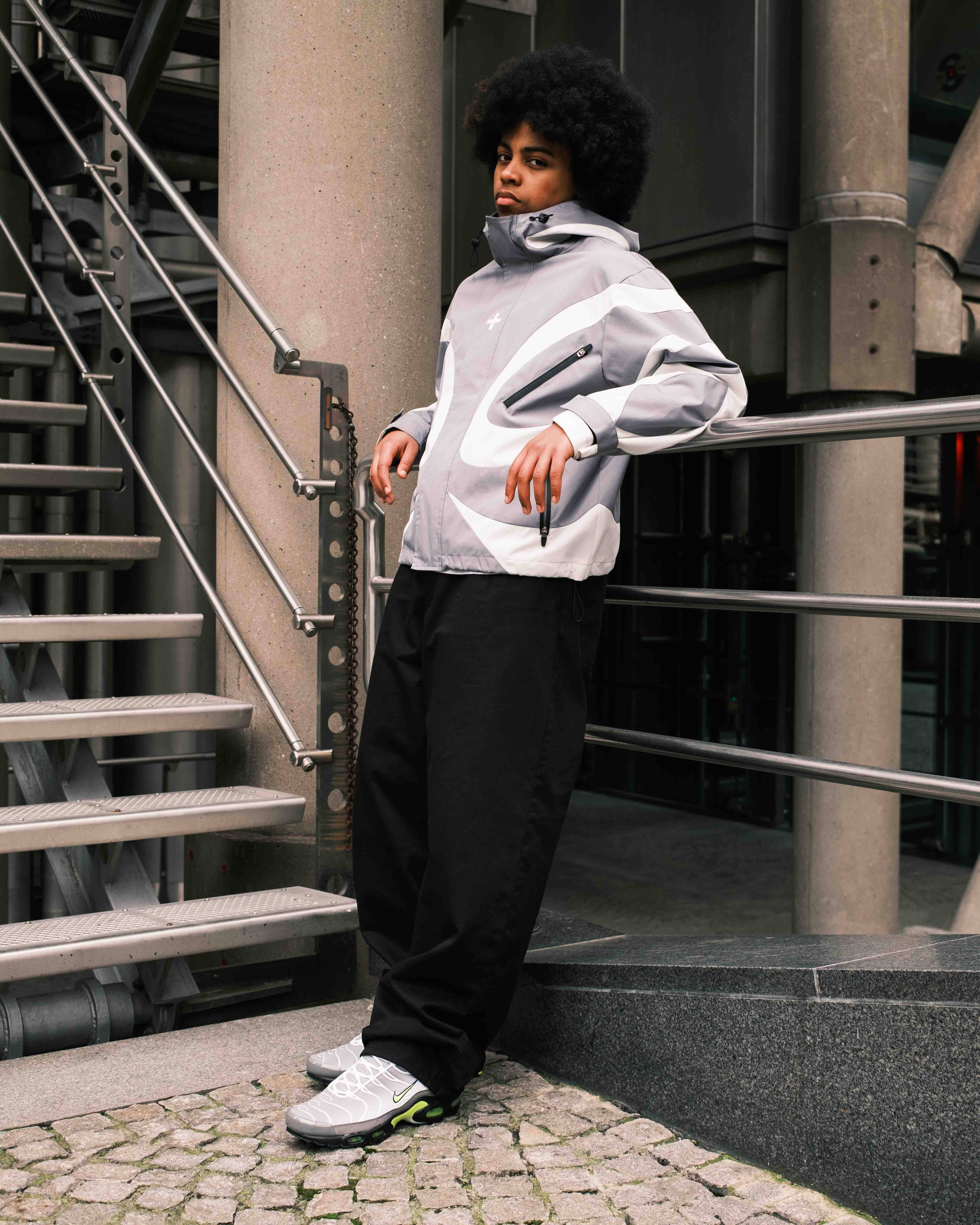 Nike Tn Neon worn by model urban backdrop
