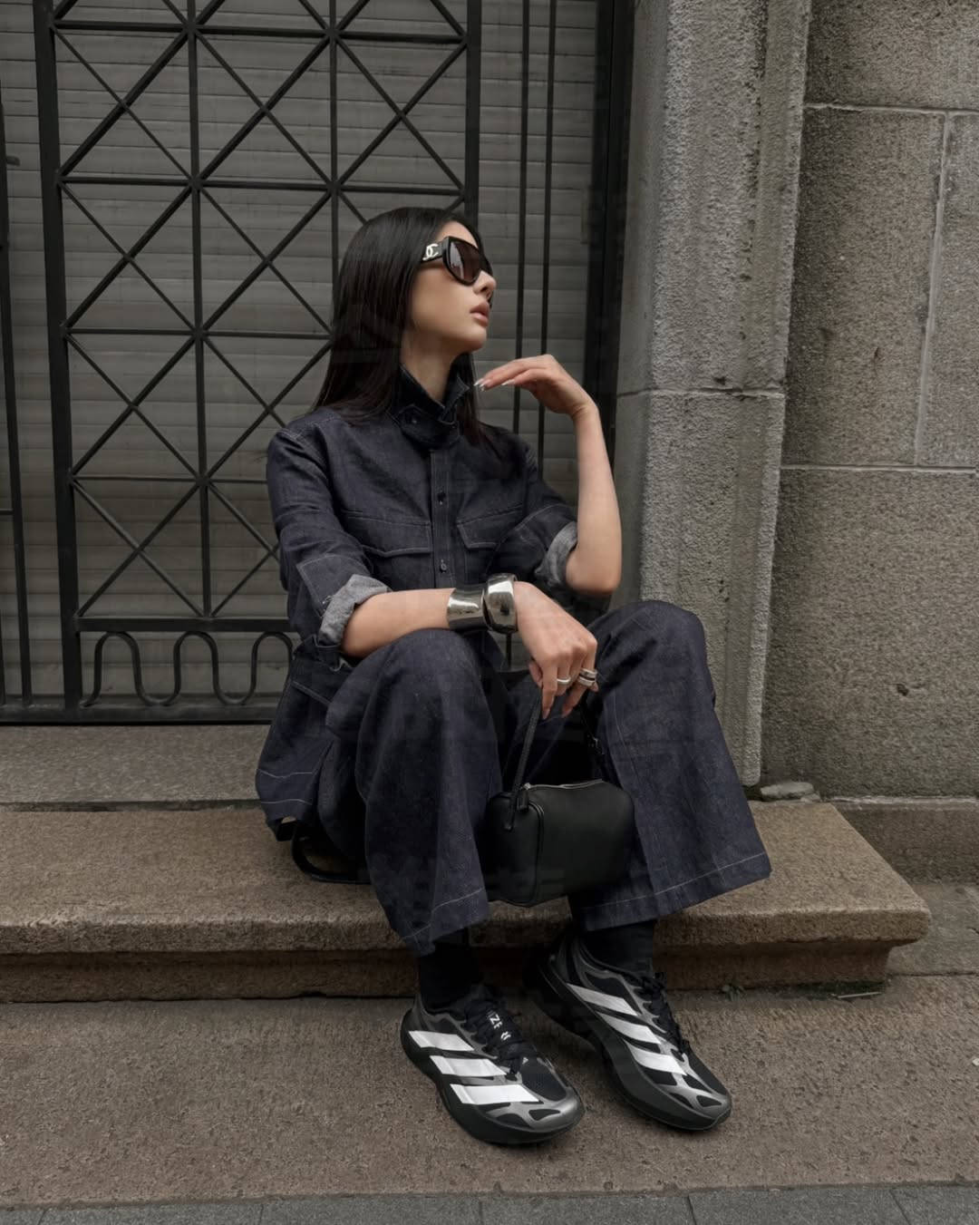 adidas adizero evo sl exo black styled with denim outfit
