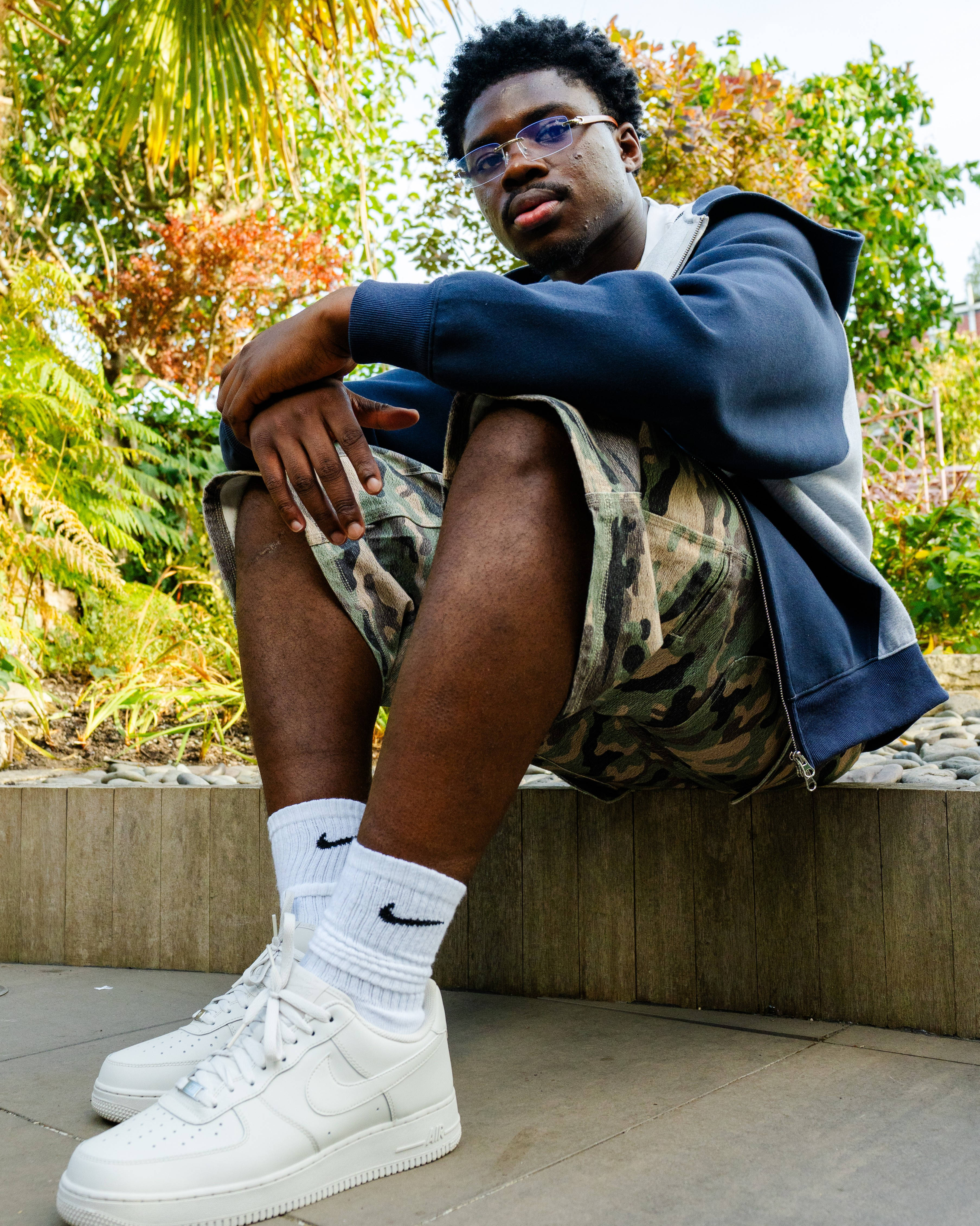sat down editorial style streetwear air force 1 outfit