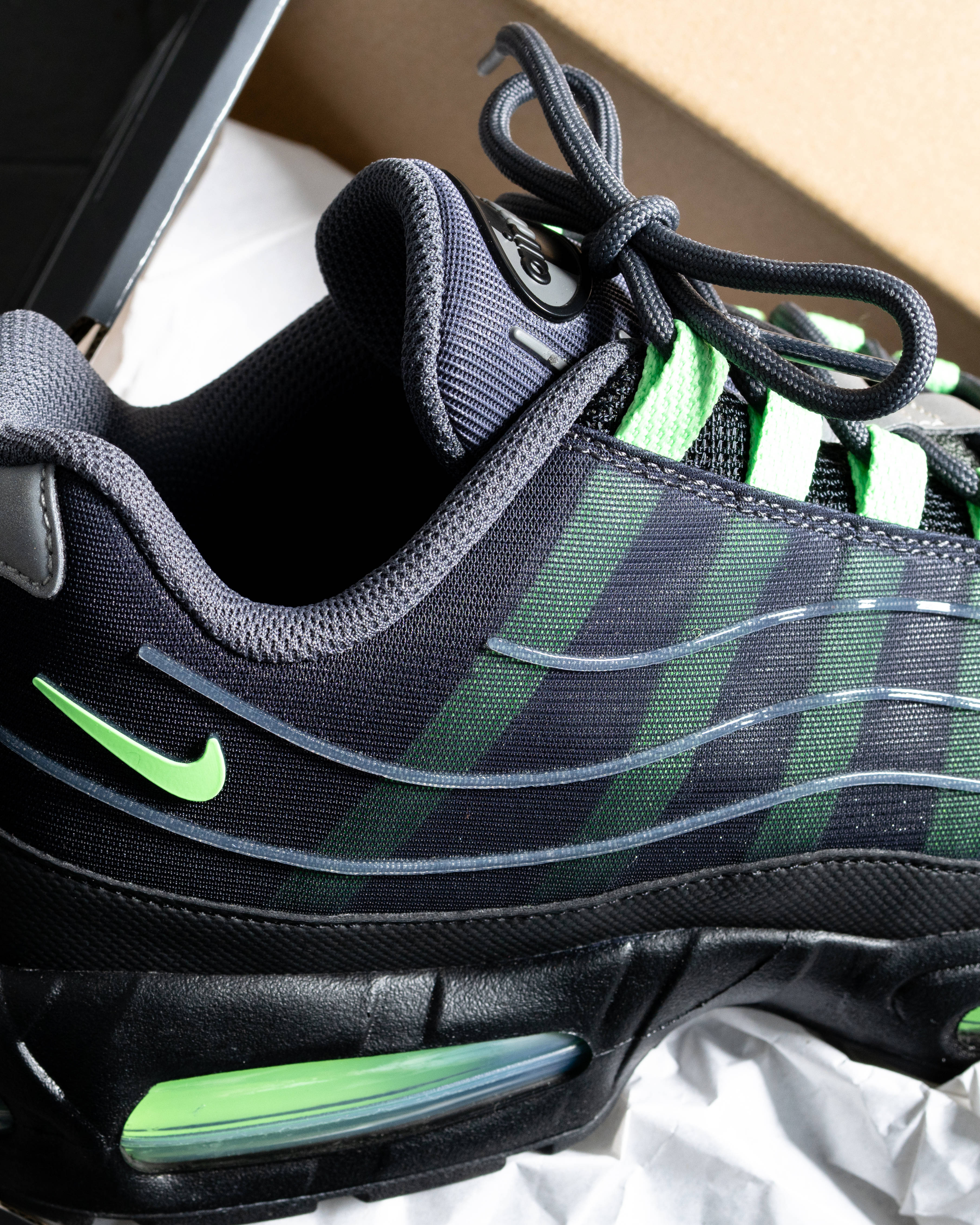 air max 95 big bubble tech black green up close shot of sidewall