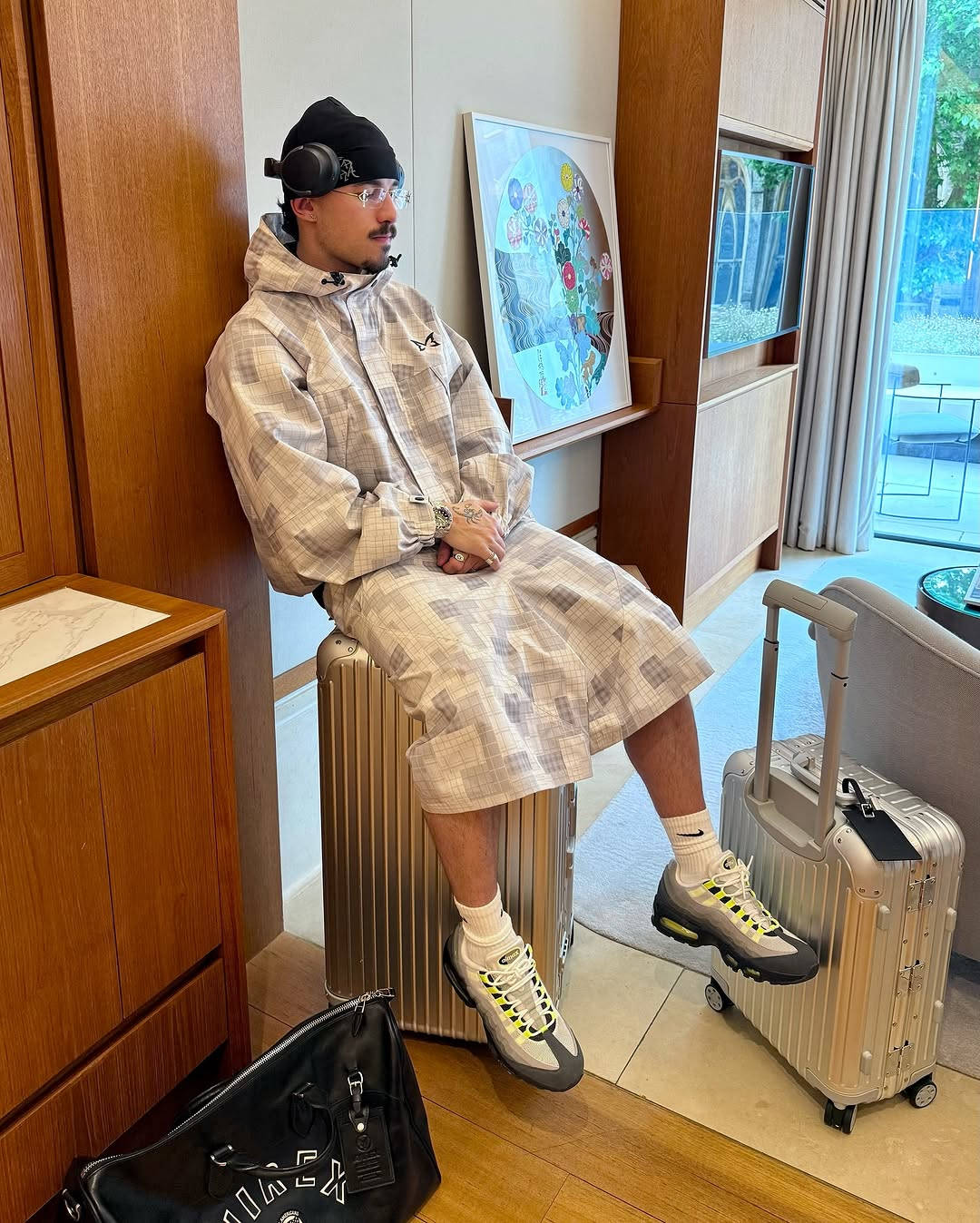 neon 110 styled with ramoa suitcase and tracksuit