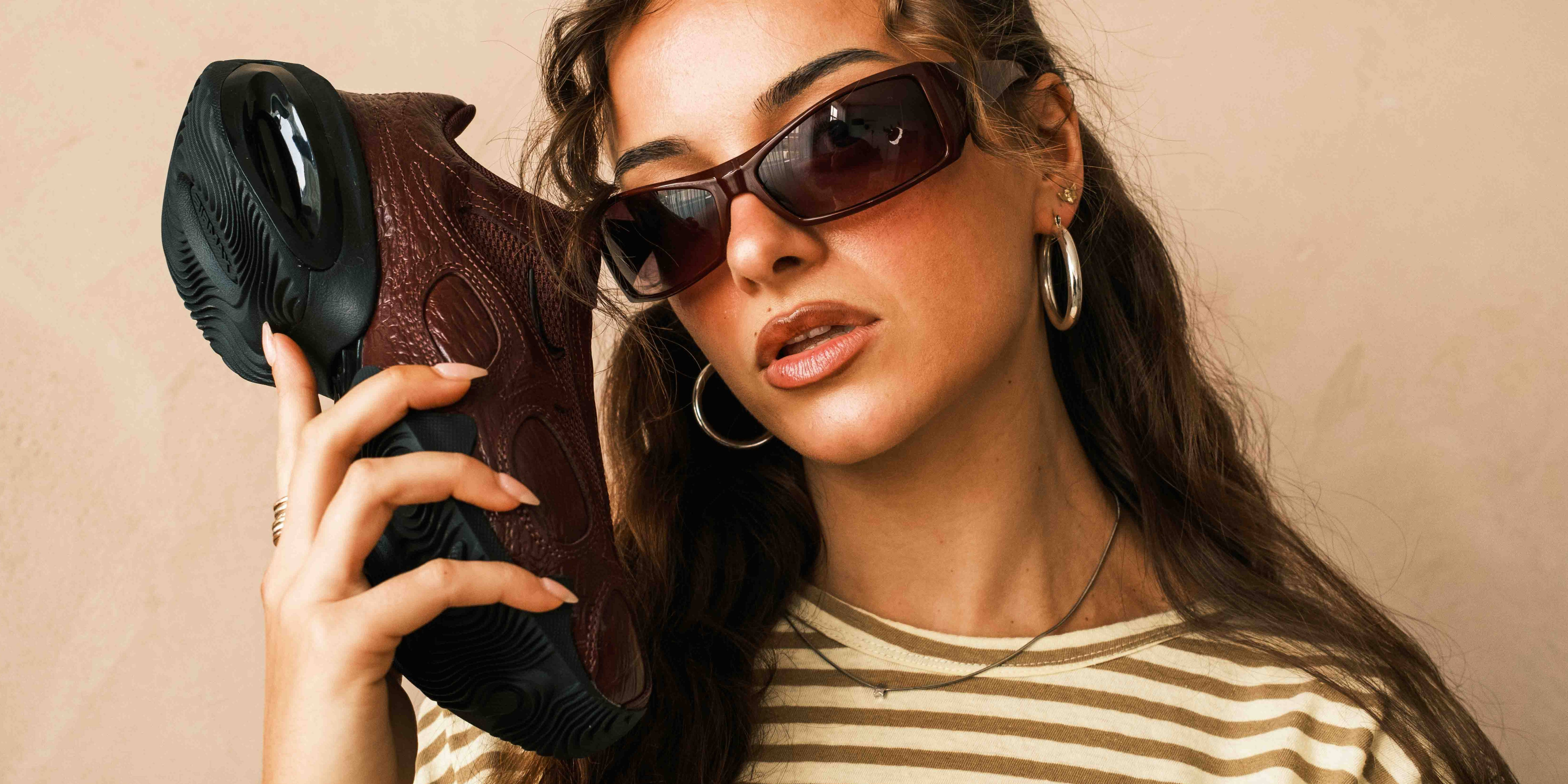 nike air max muse burgundy croc pair close to face sunglasses editorial