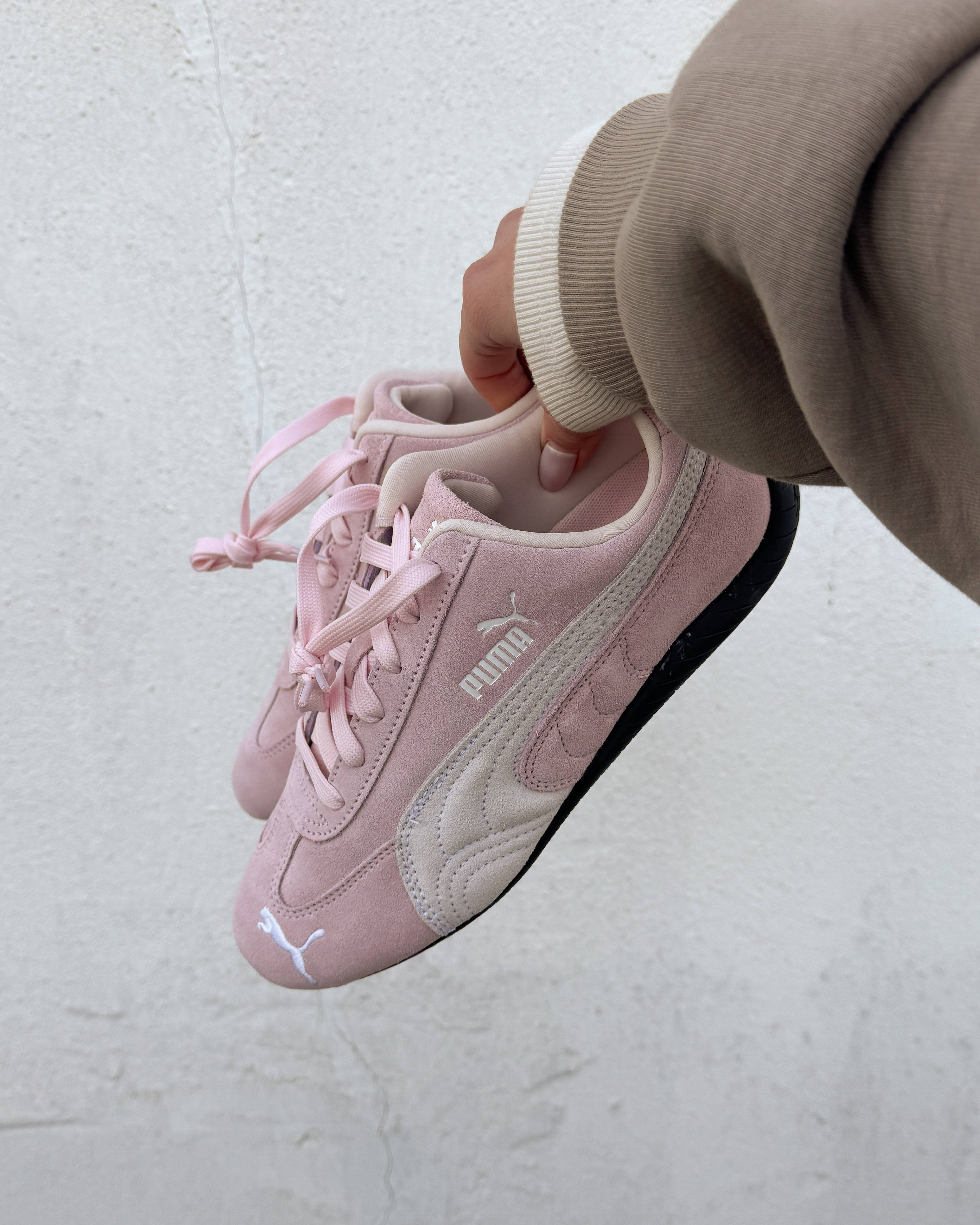 puma speedcat pink in hand low profile