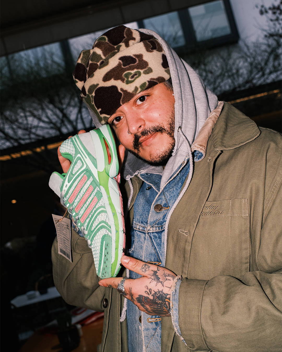 The Sole Supplier's Taylor posing with Unheardof x adidas Piggy Runner 2.0 in Paris flash photography