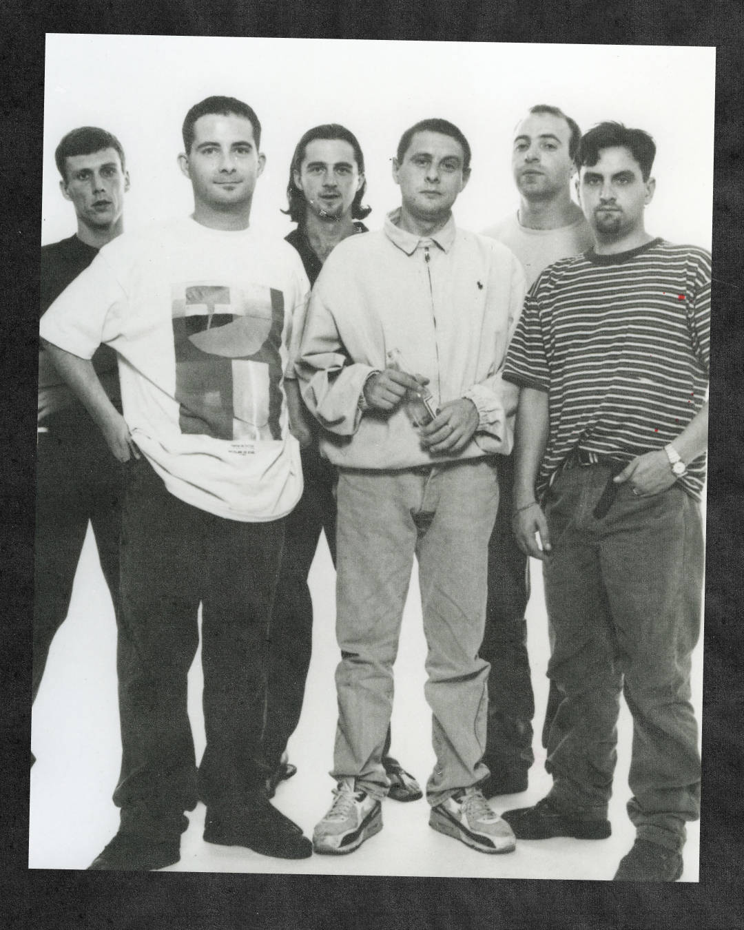 the happy mondays 1992 photoshoot lead singer wearing the Nike air max 90s