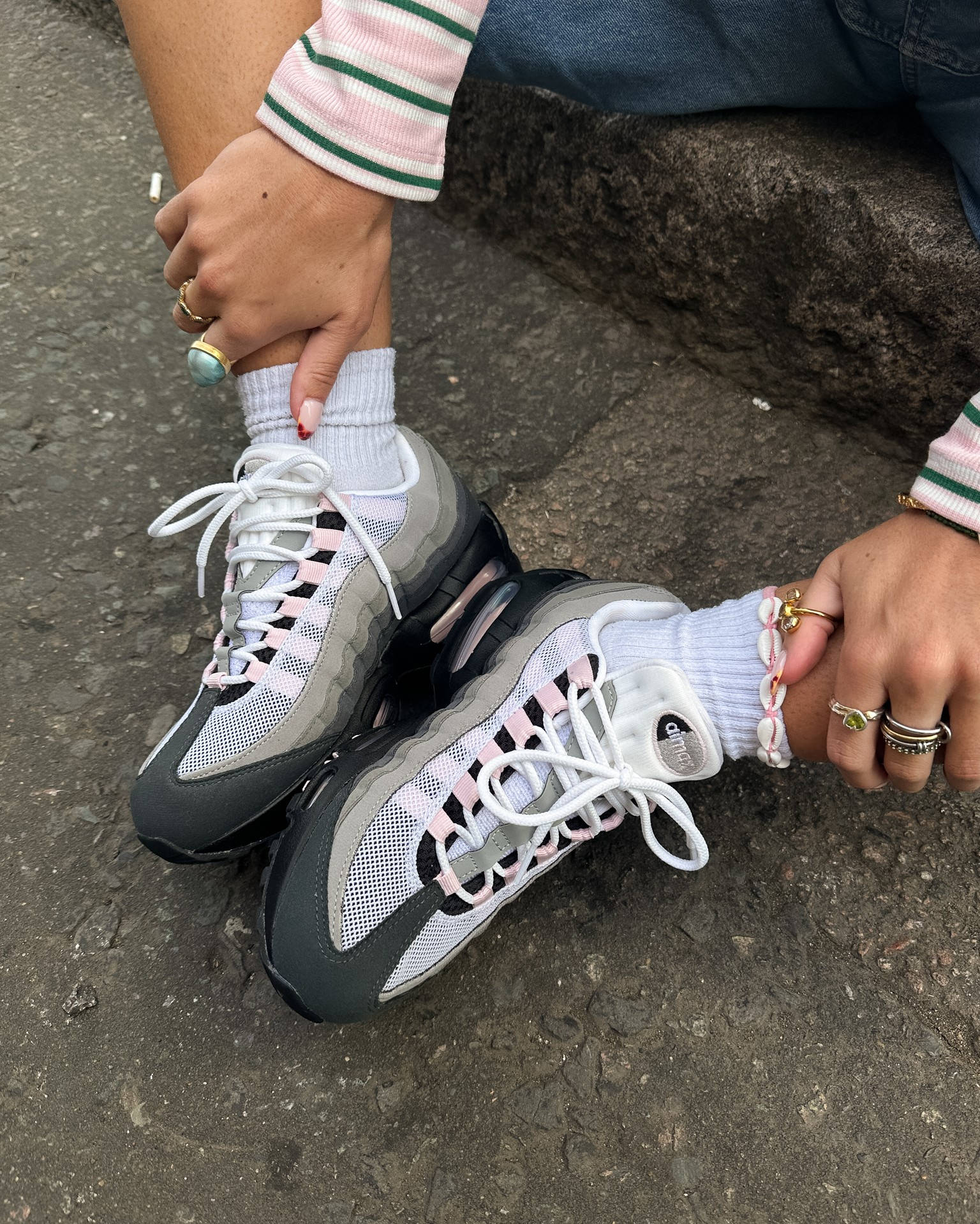 nike air max 95 pink foams girly editorial against concrete backdrop
