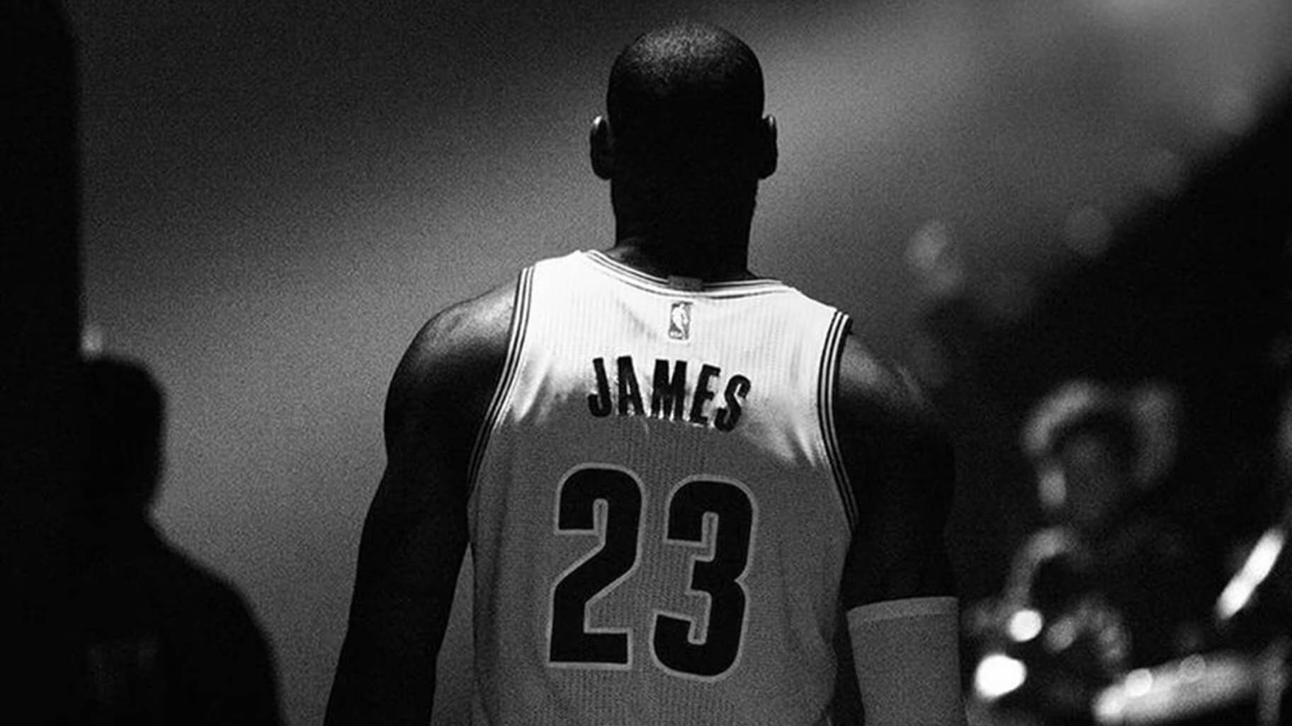 lebron james wearing nba jersey rear shot black and white