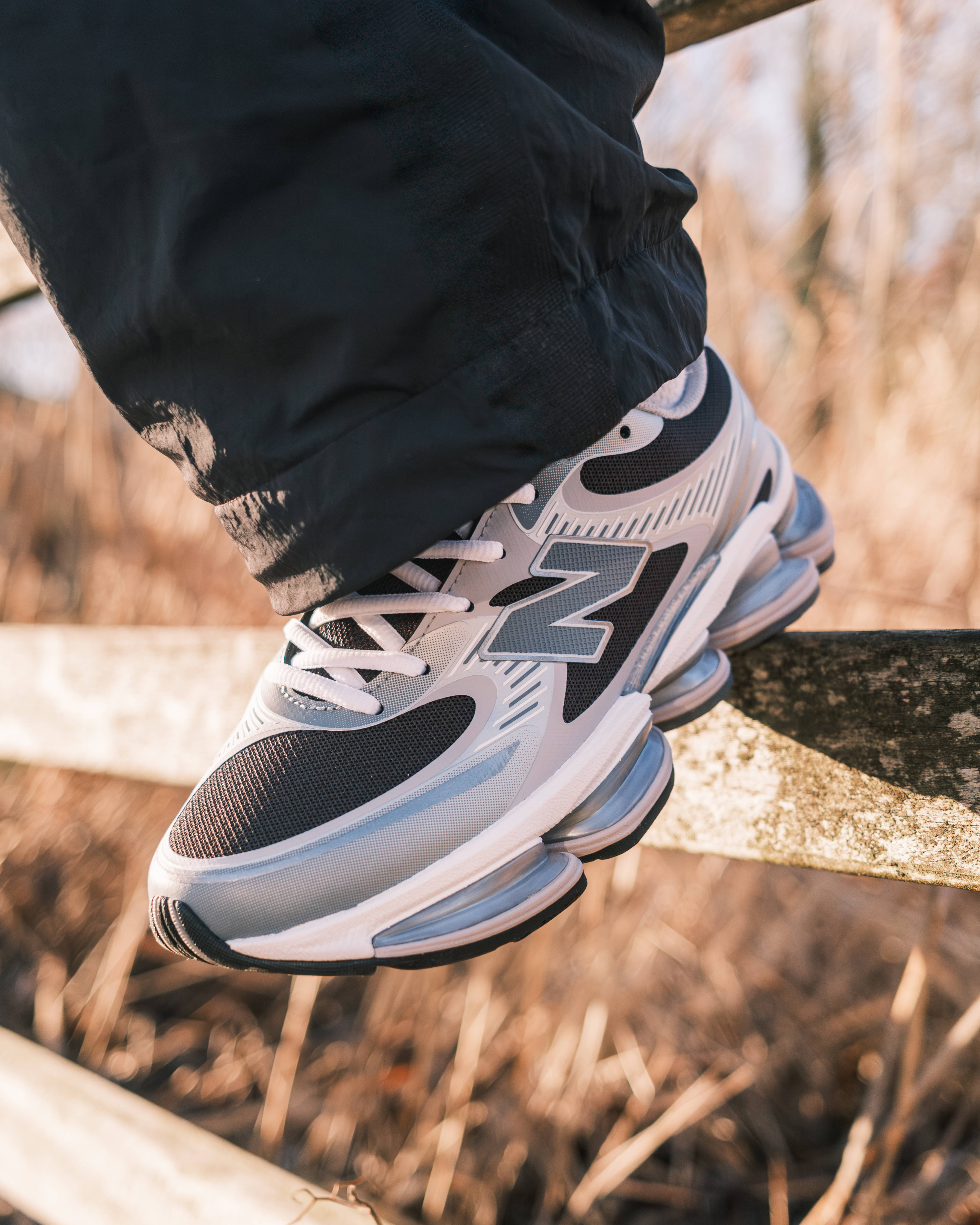 new balance abzorb 2000 on foot shot with concrete backdrop