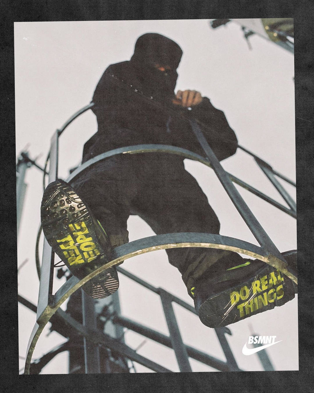 Male model hooded figure bottom up shot wearing the basement x nike air max 90 "manchester" outsole shot reading "real people" "do real things"