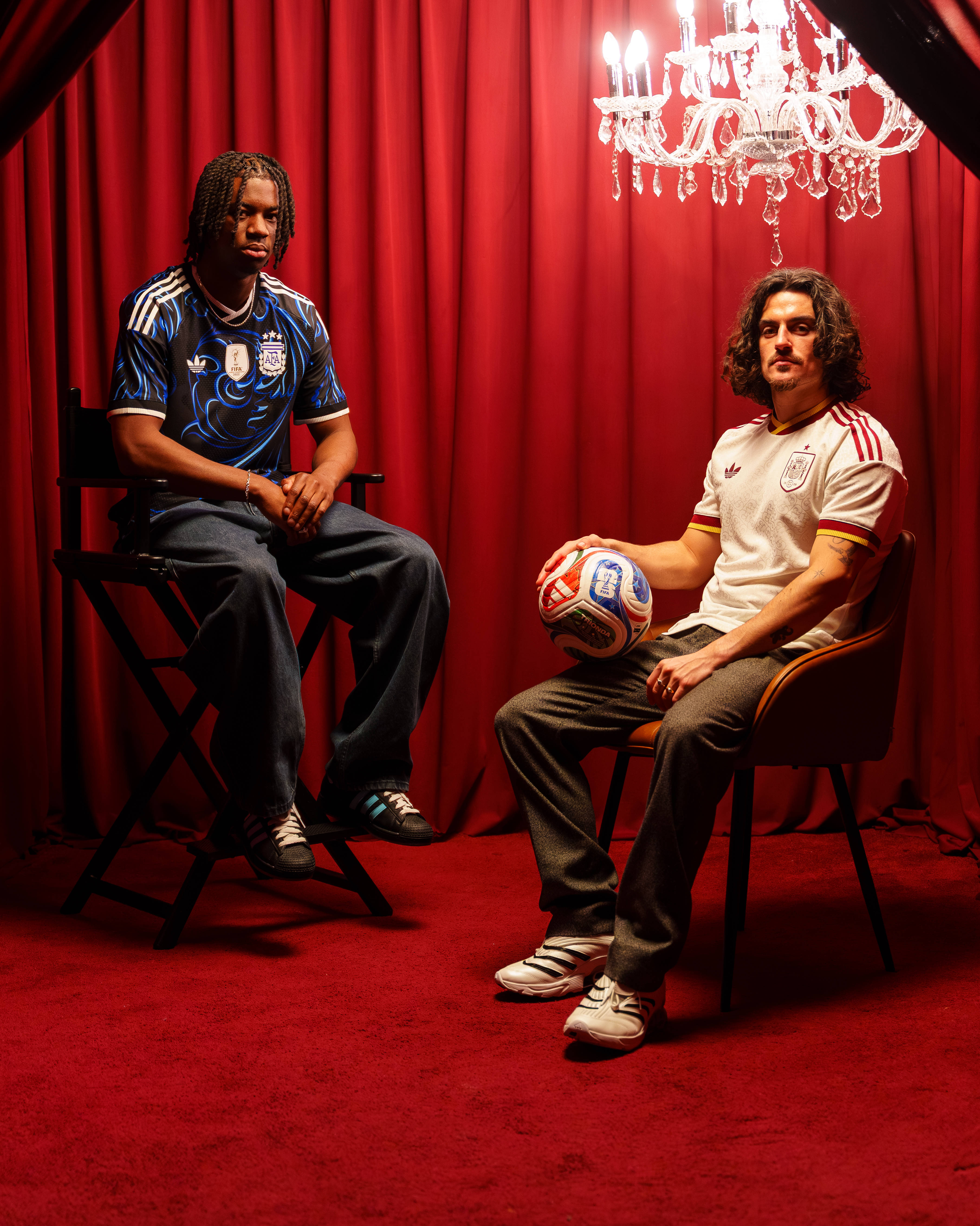 adidas away kit editorial image intro red curtain chandalier