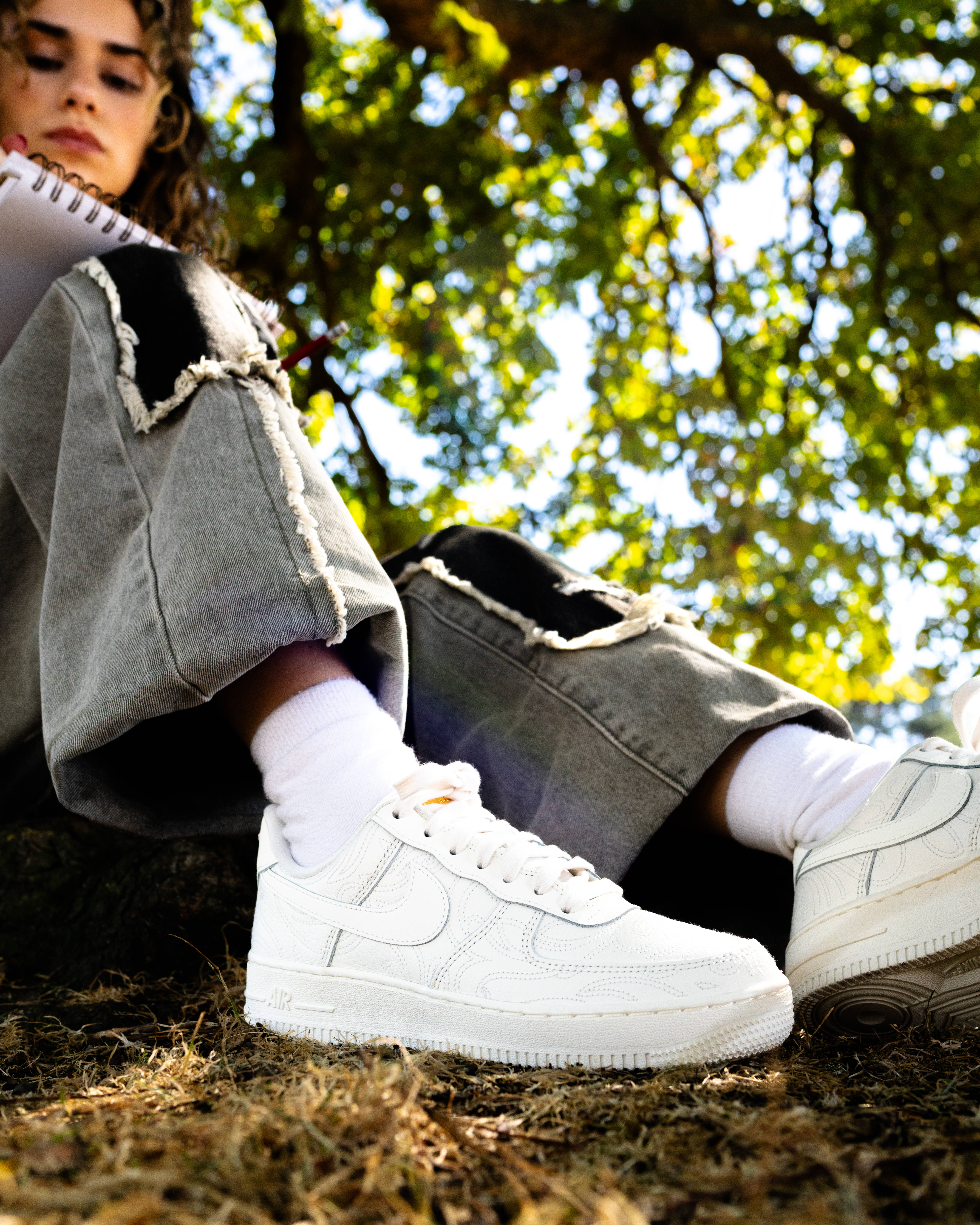 emilia poyiadgi air force 1 close up woodland floor