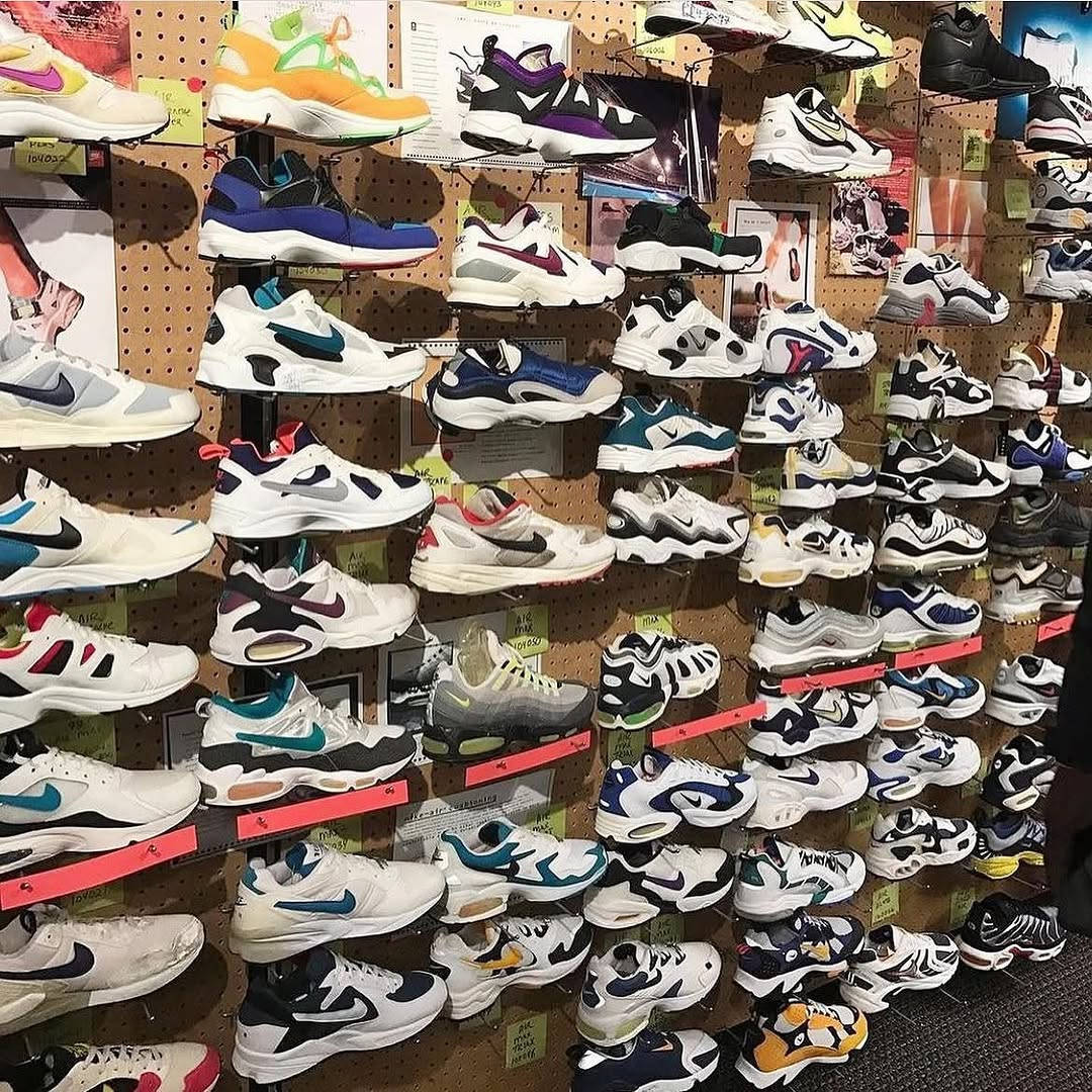 wall of nike air max trainers early 2000s sports shop