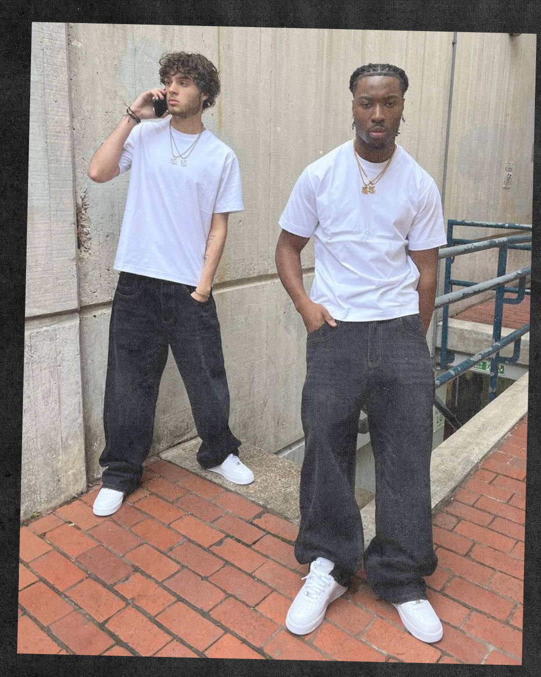 two uk male streetwear models wearing clean white t shirt and black denim paired white white on white air force 1 in london settings