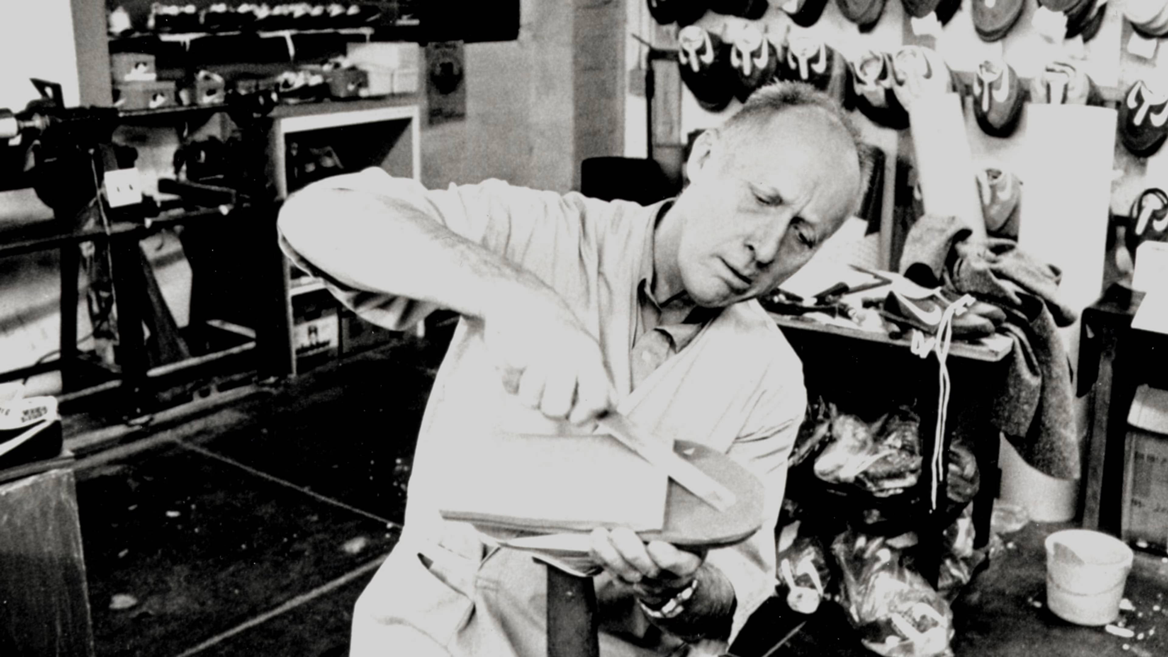 bill bowerman tinkering on shoes in the 60s