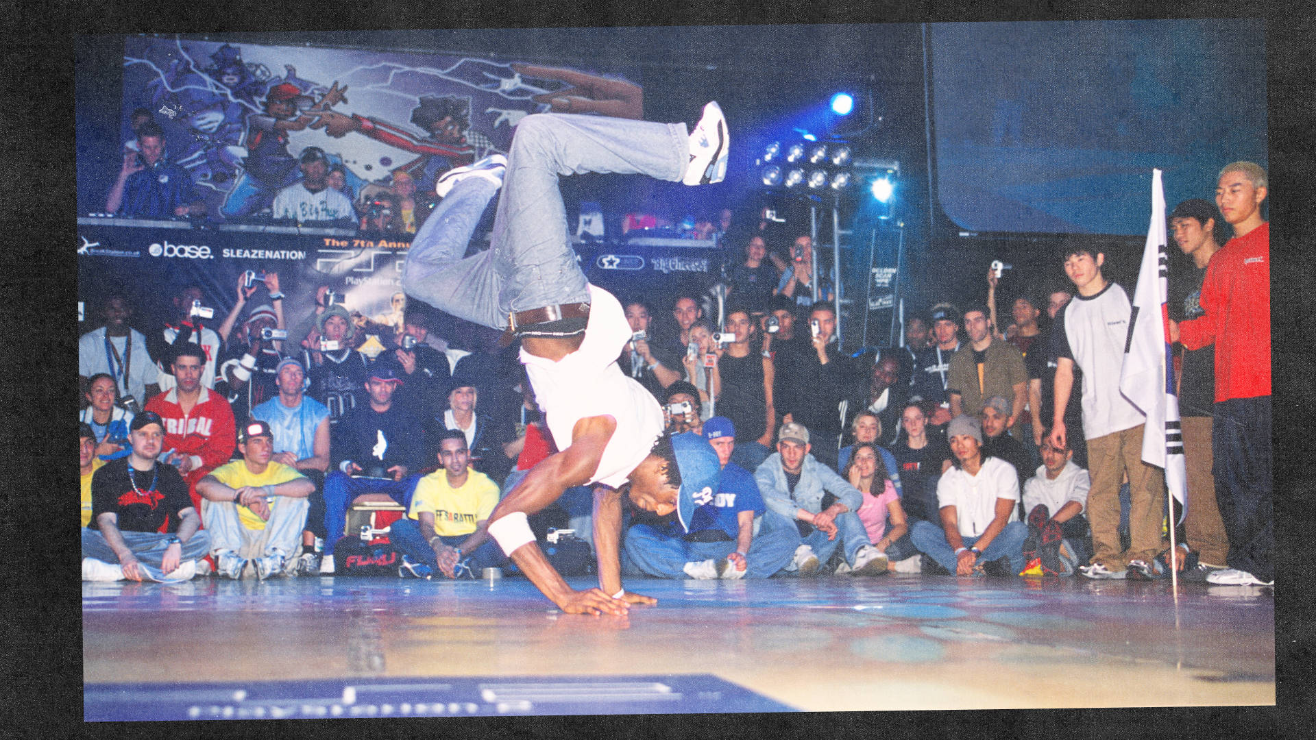 Nike Air Max 90 Laser Blue worn by Breakdancer peforming power move in Brixton Academy in the late 2000s