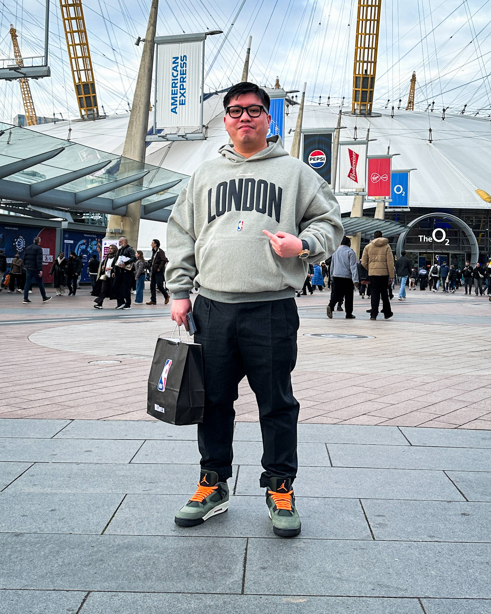 NBA fan wearing Undefeated Jordan 4s outside 02 Arena during NBA London 2026