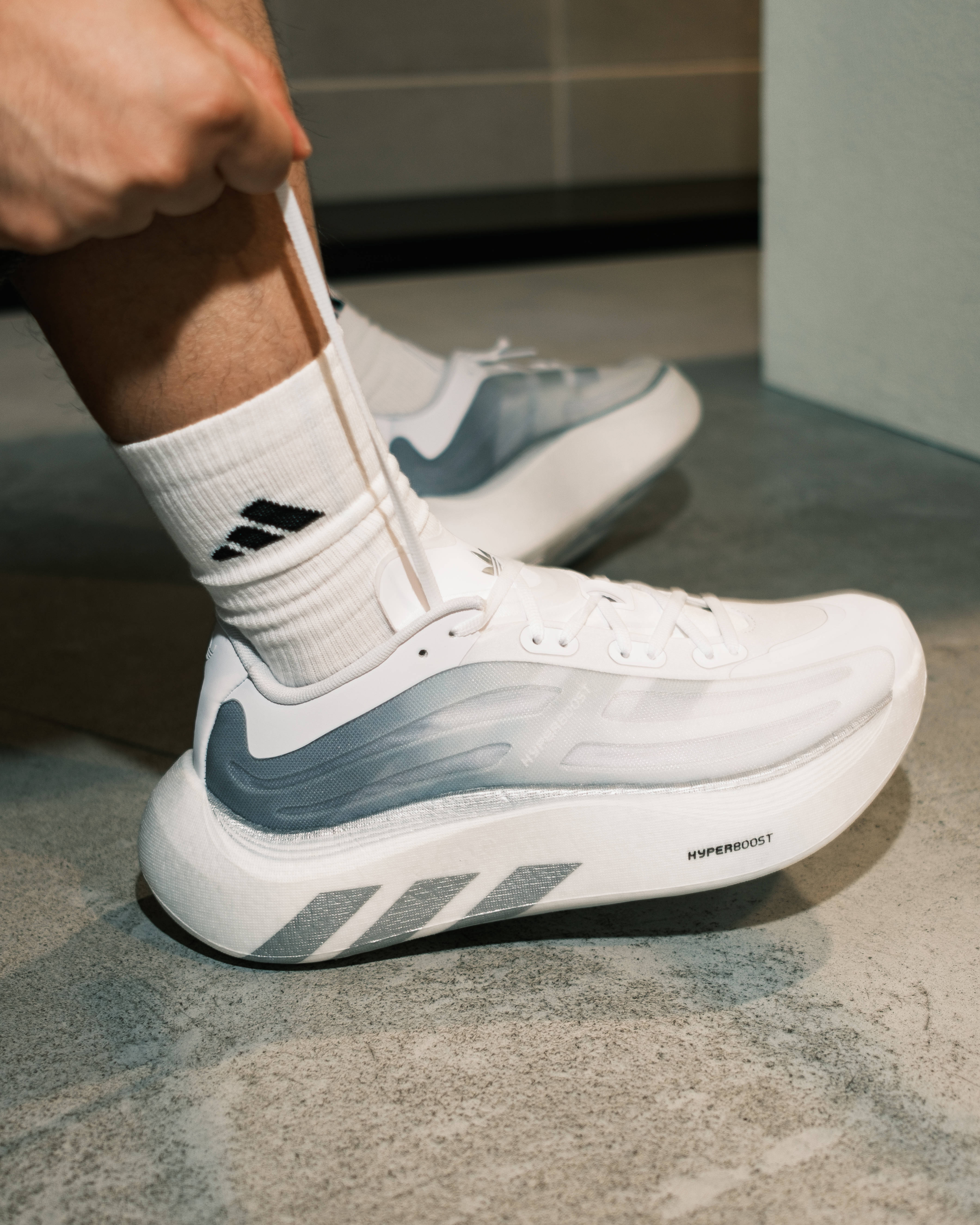 adidas hyperboost euphoria on feet side angle shots with adidas socks