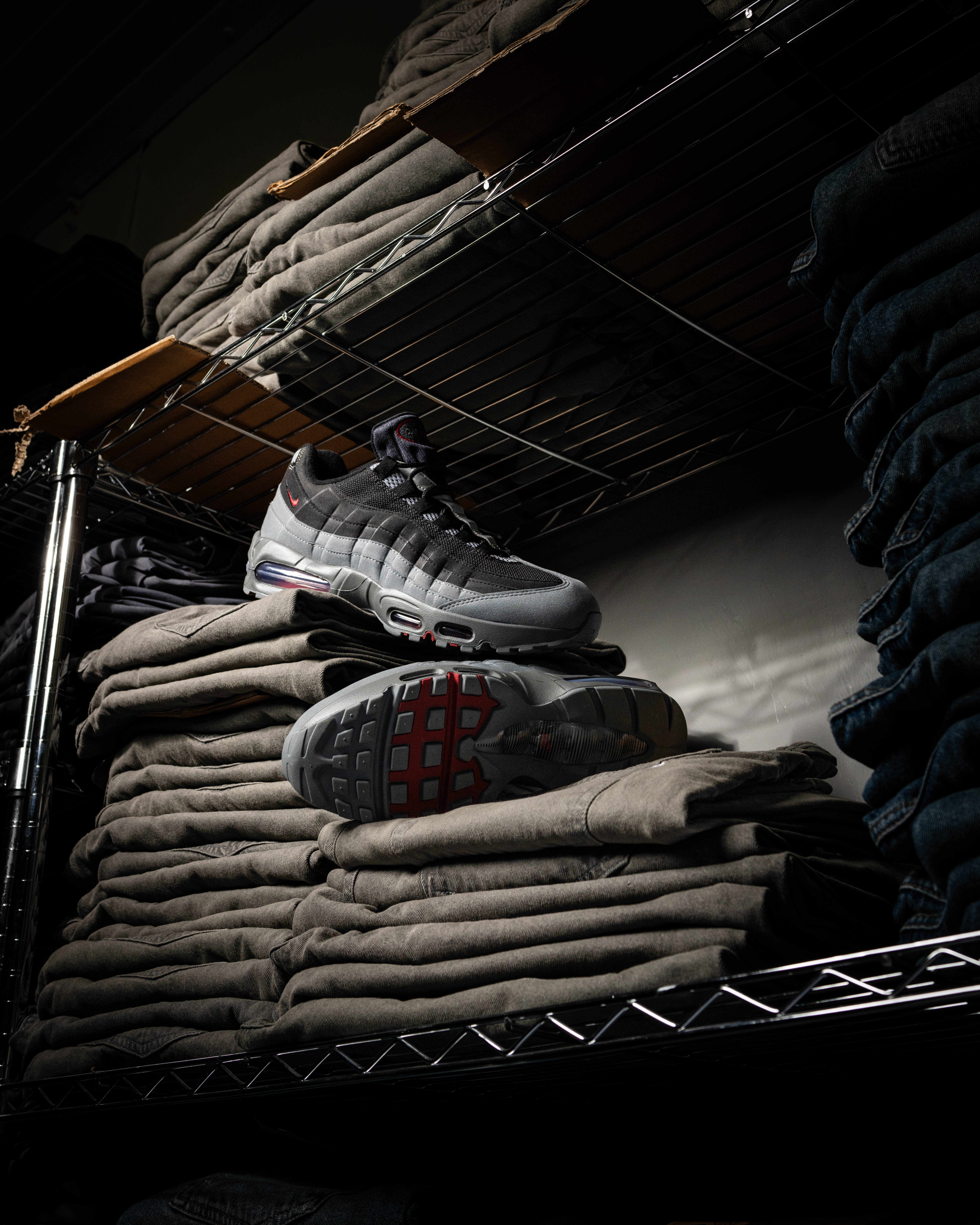 air max 95 on denim pile on metal racking