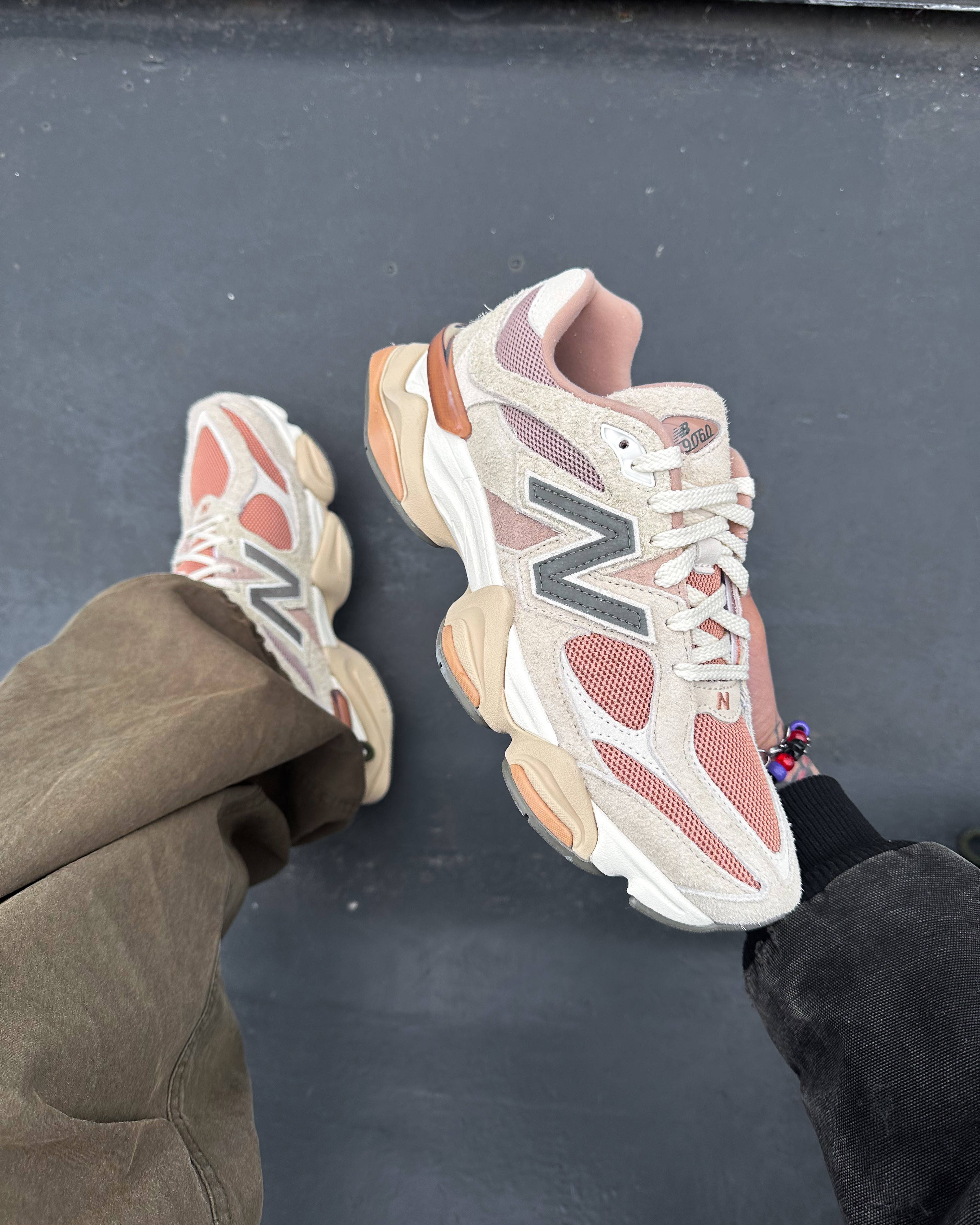 new balance 9060 melon pink in hand