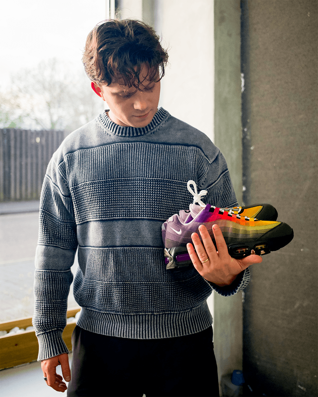 lorenzog holding the new atmos nike air max 95 release