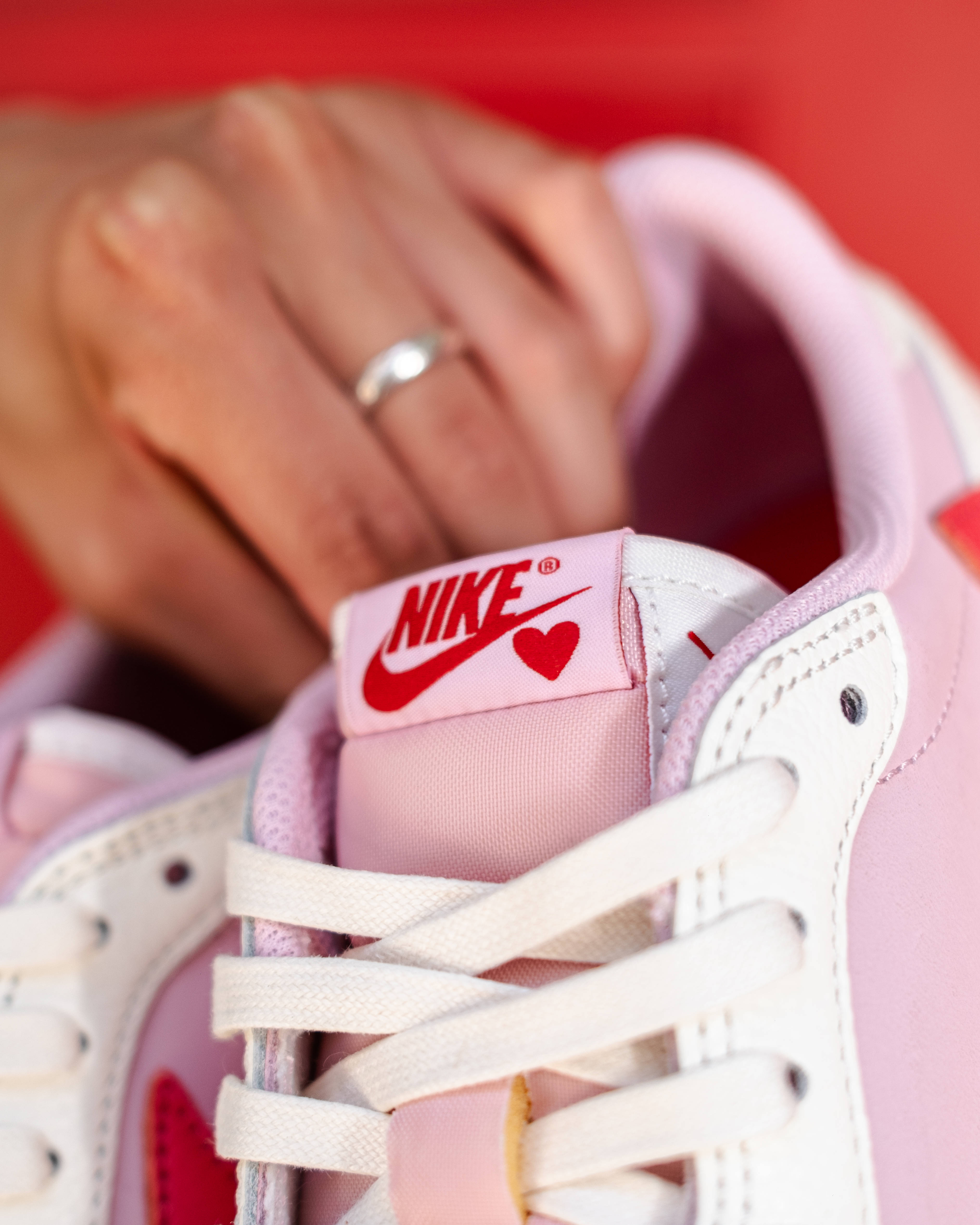 travis scott shy pink jordan 1 low tongue