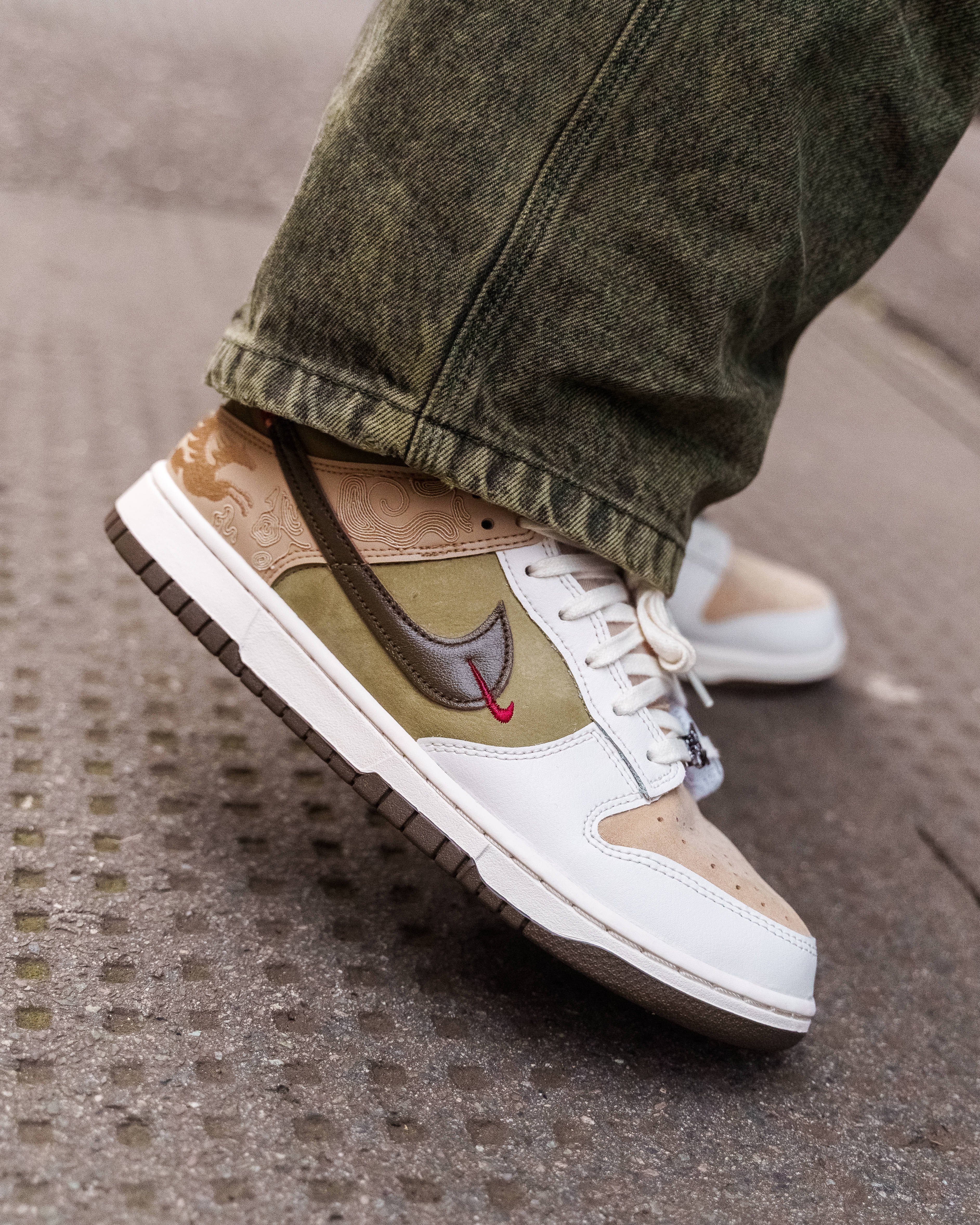 Nike Dunk Low SE LNY Year of the horse against bamboo backdrop