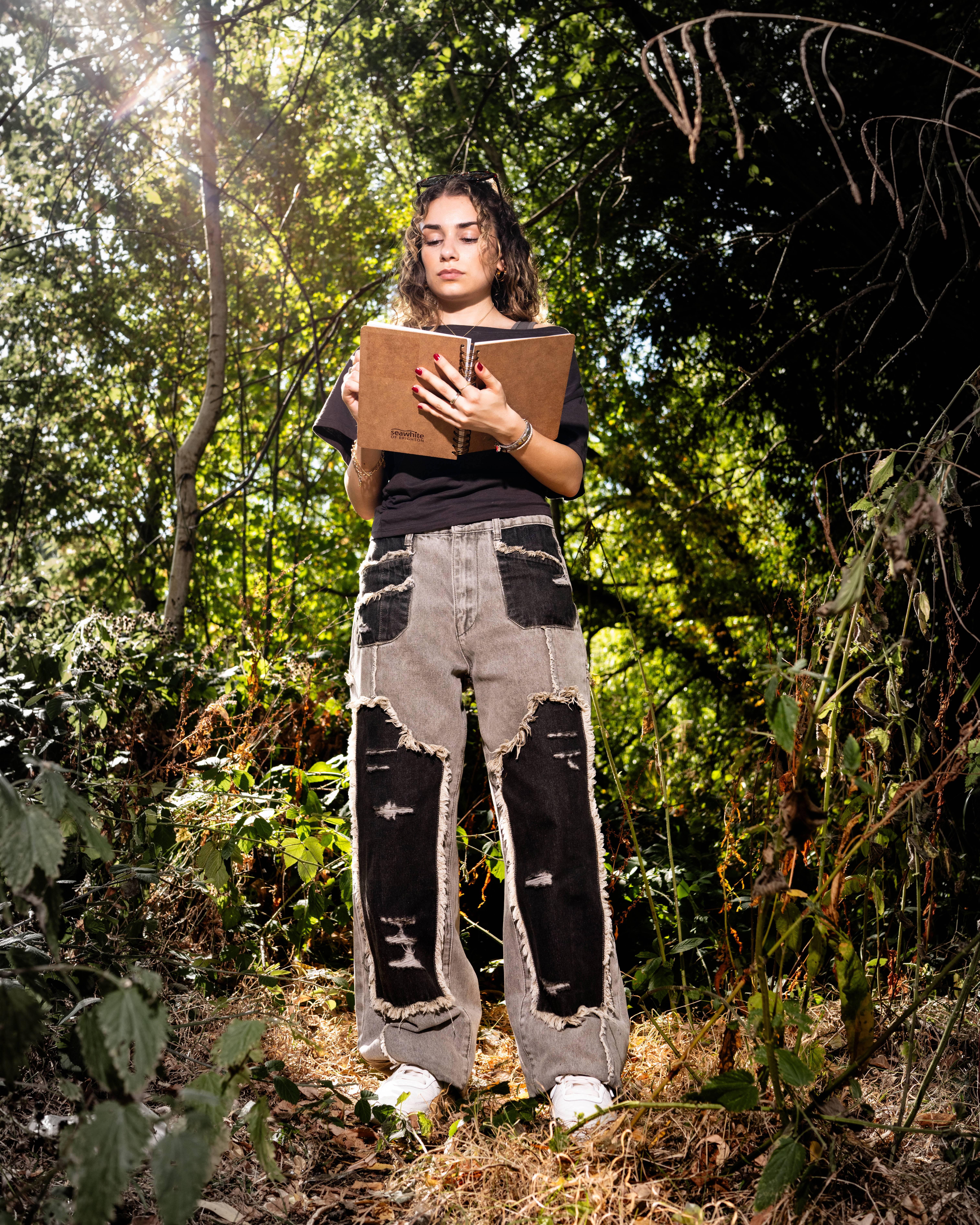 emilia poyiadgi drawing in the forest for air force 1 campaign