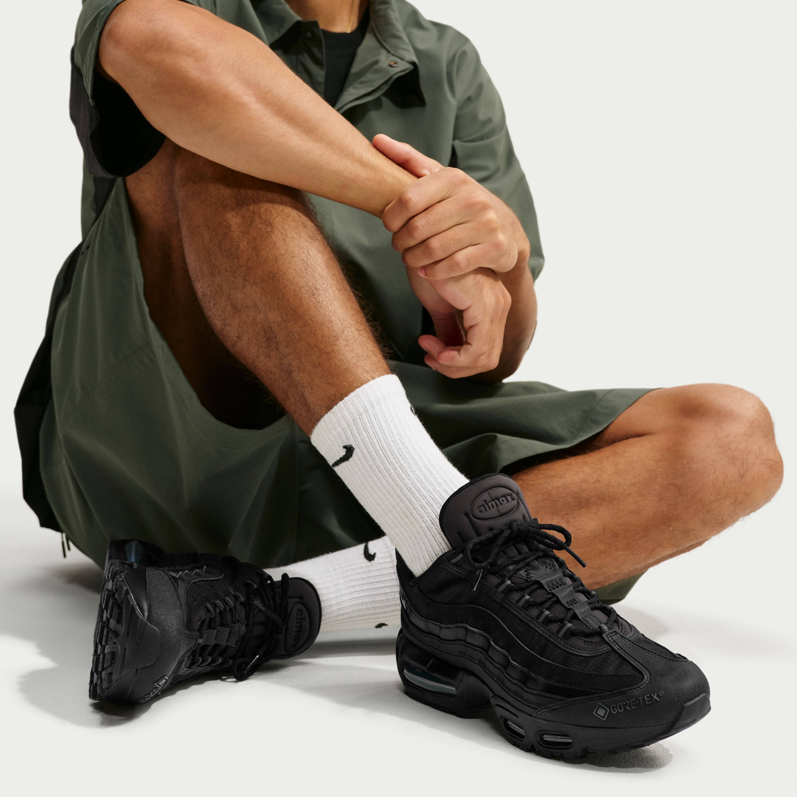 Nike Air Max 95 GORE TEX Triple BlackIO1877 002 on foot